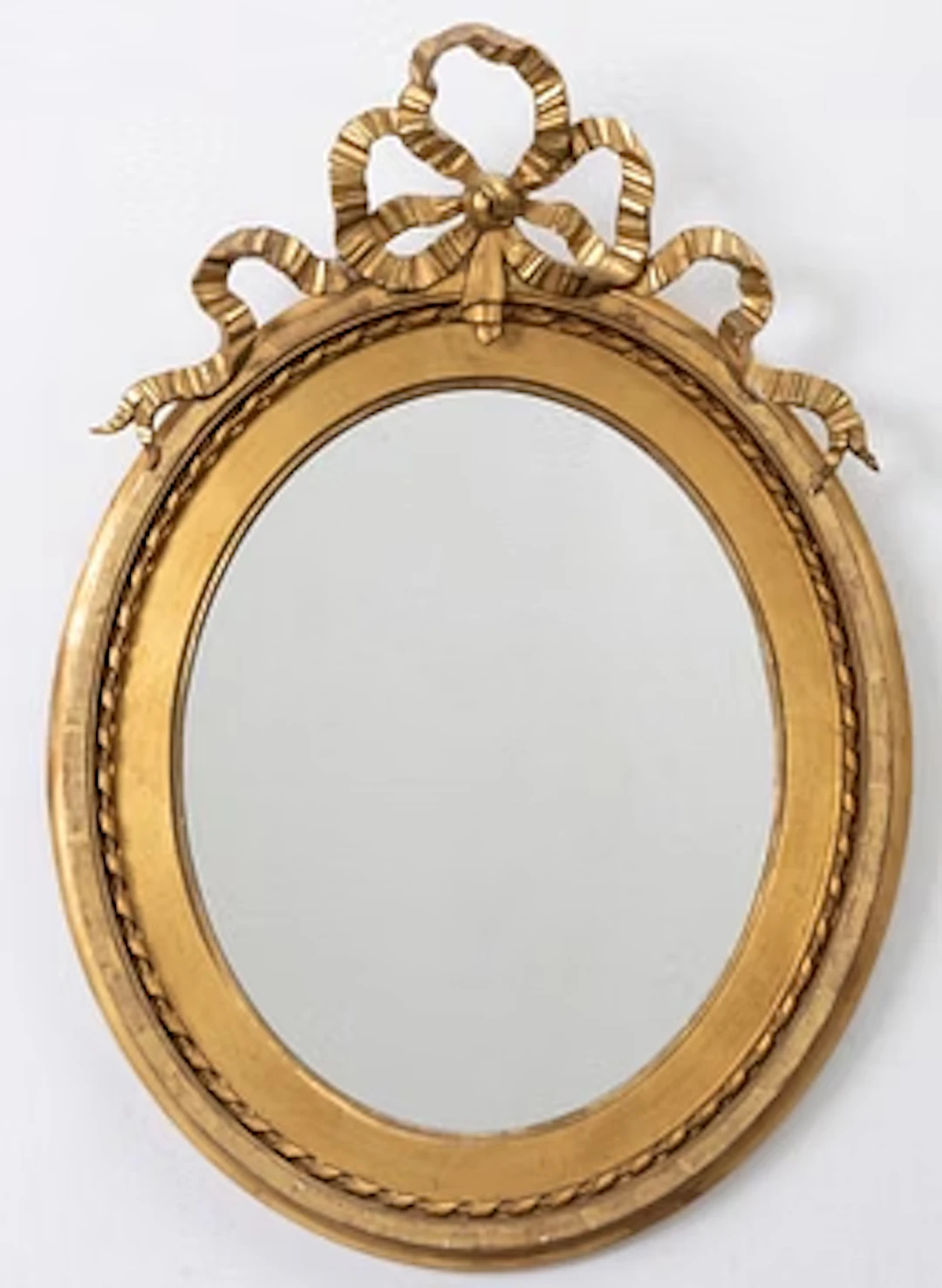 A Gustavian style mirror, early 20th Century.