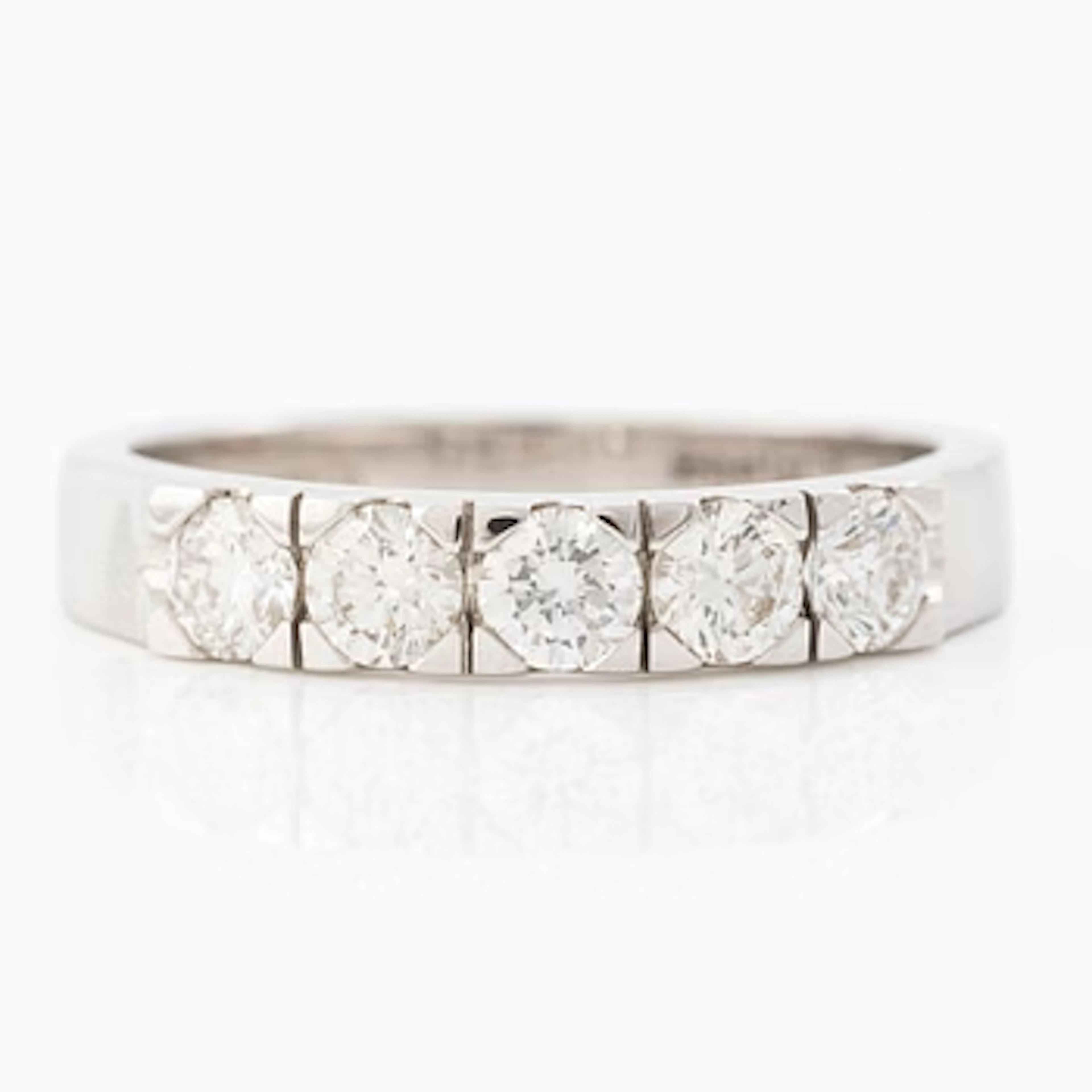 Ring 18K white gold half eternity band set with brilliant-cut diamonds.