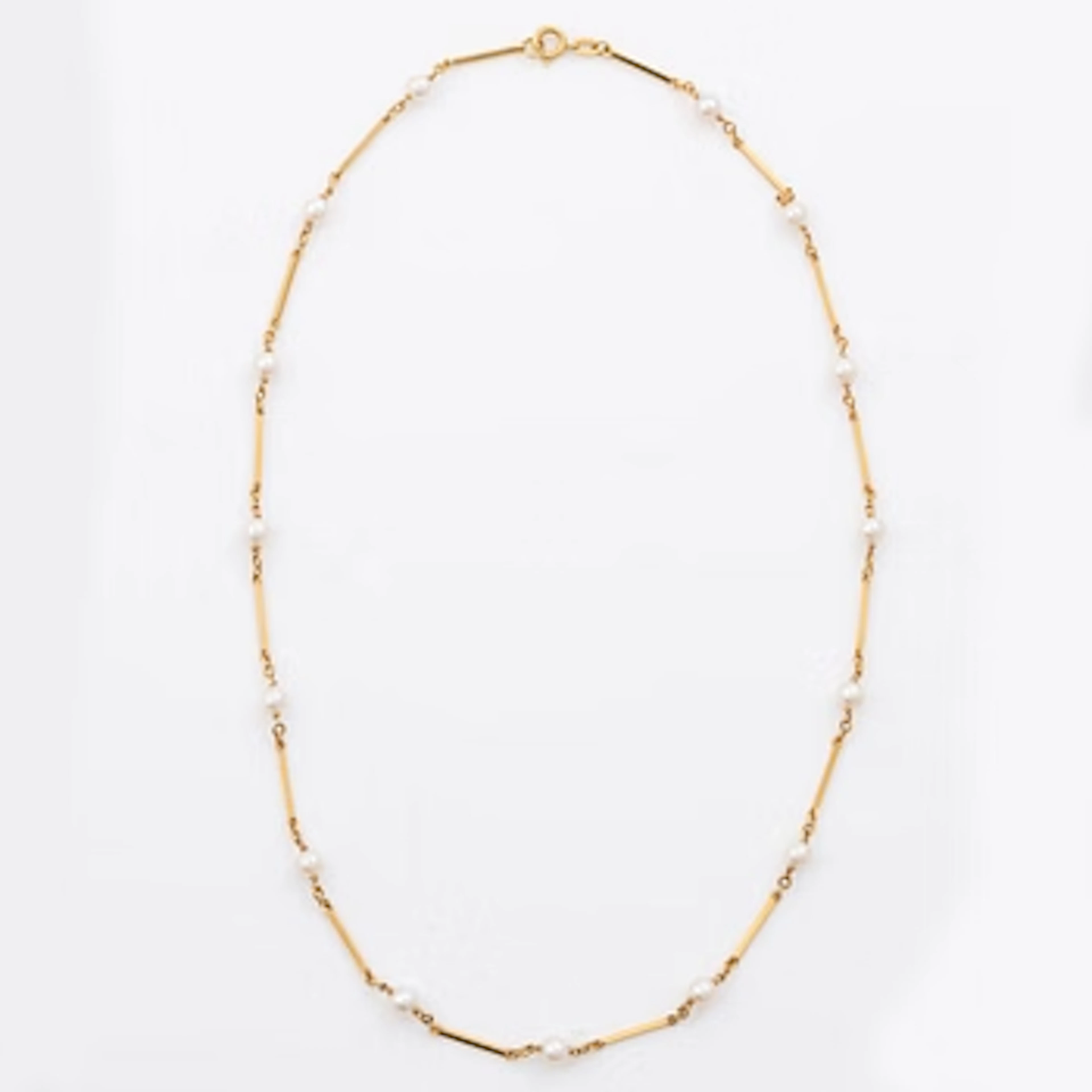 Necklace, 18K gold with small pearls.