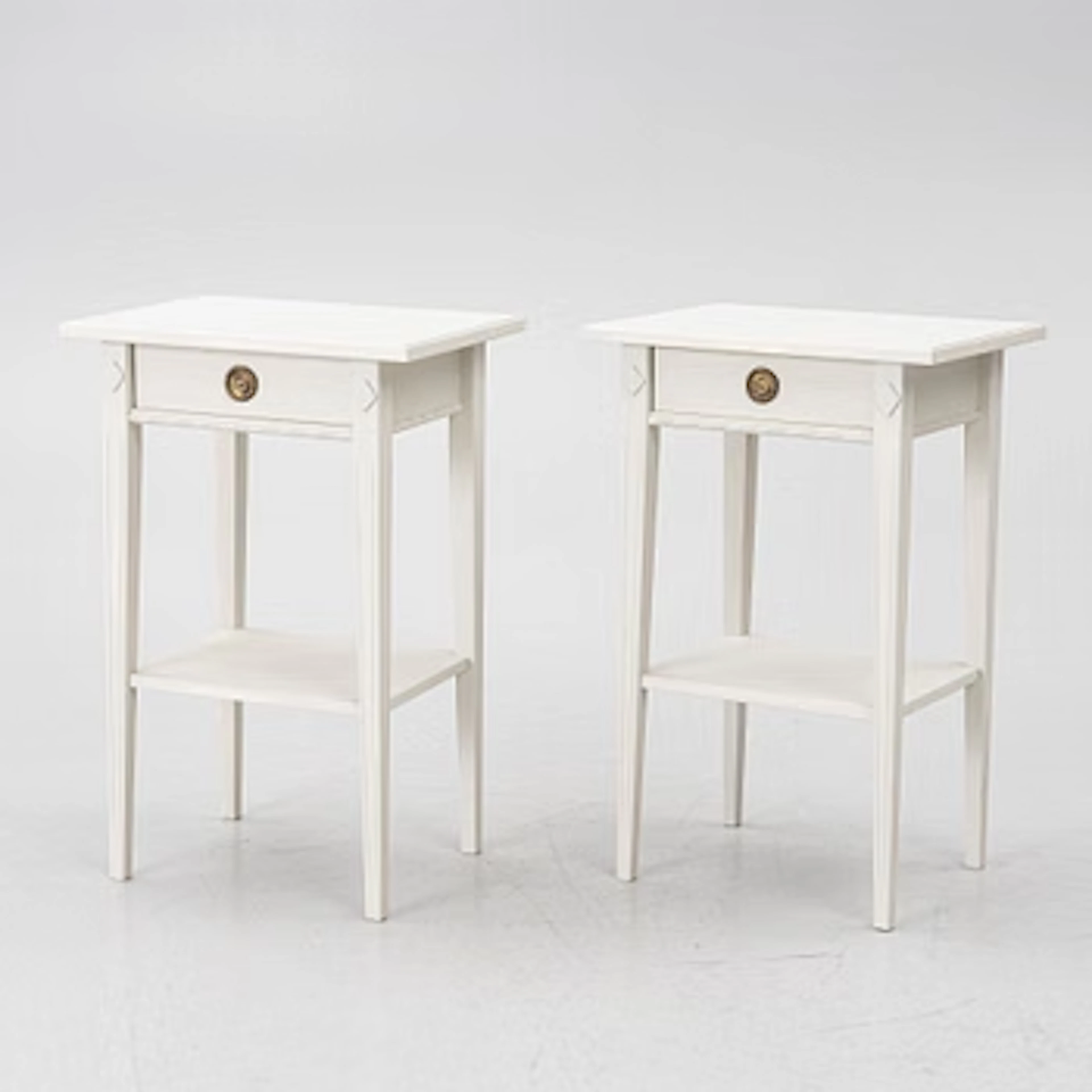 A pair of Gustavian style bedside tables, second half of the 20th century.