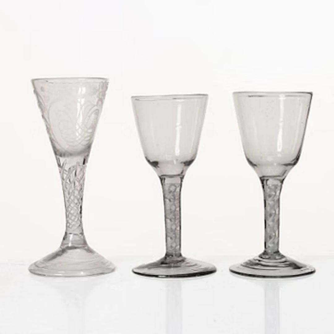 Three spiral-stemmed glasses, 18th Century.