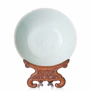 A carved qingbai foliate bowl, Song dynasty (960-1279).