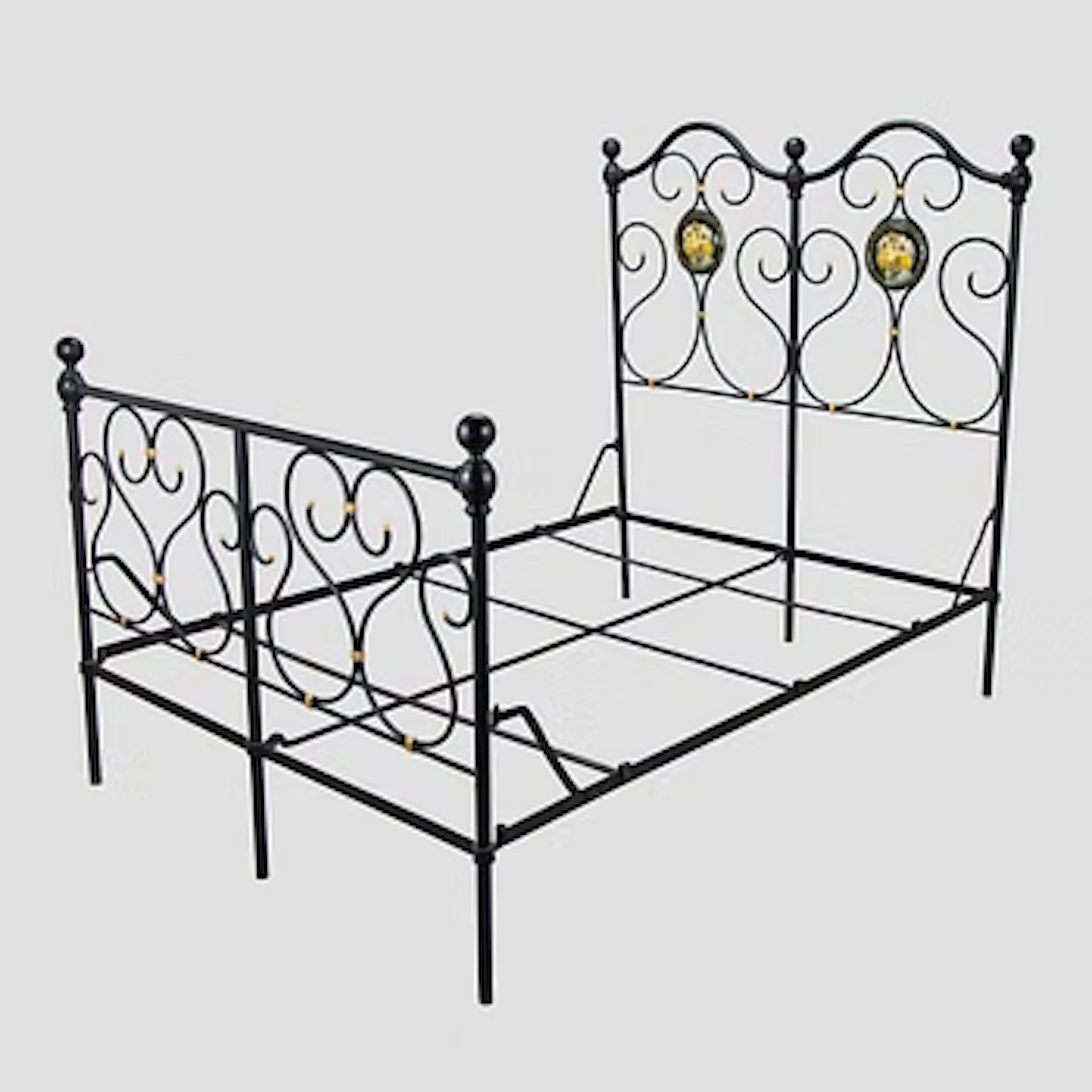 A wrought iron bed with Art Nouveau motif, around 1900.