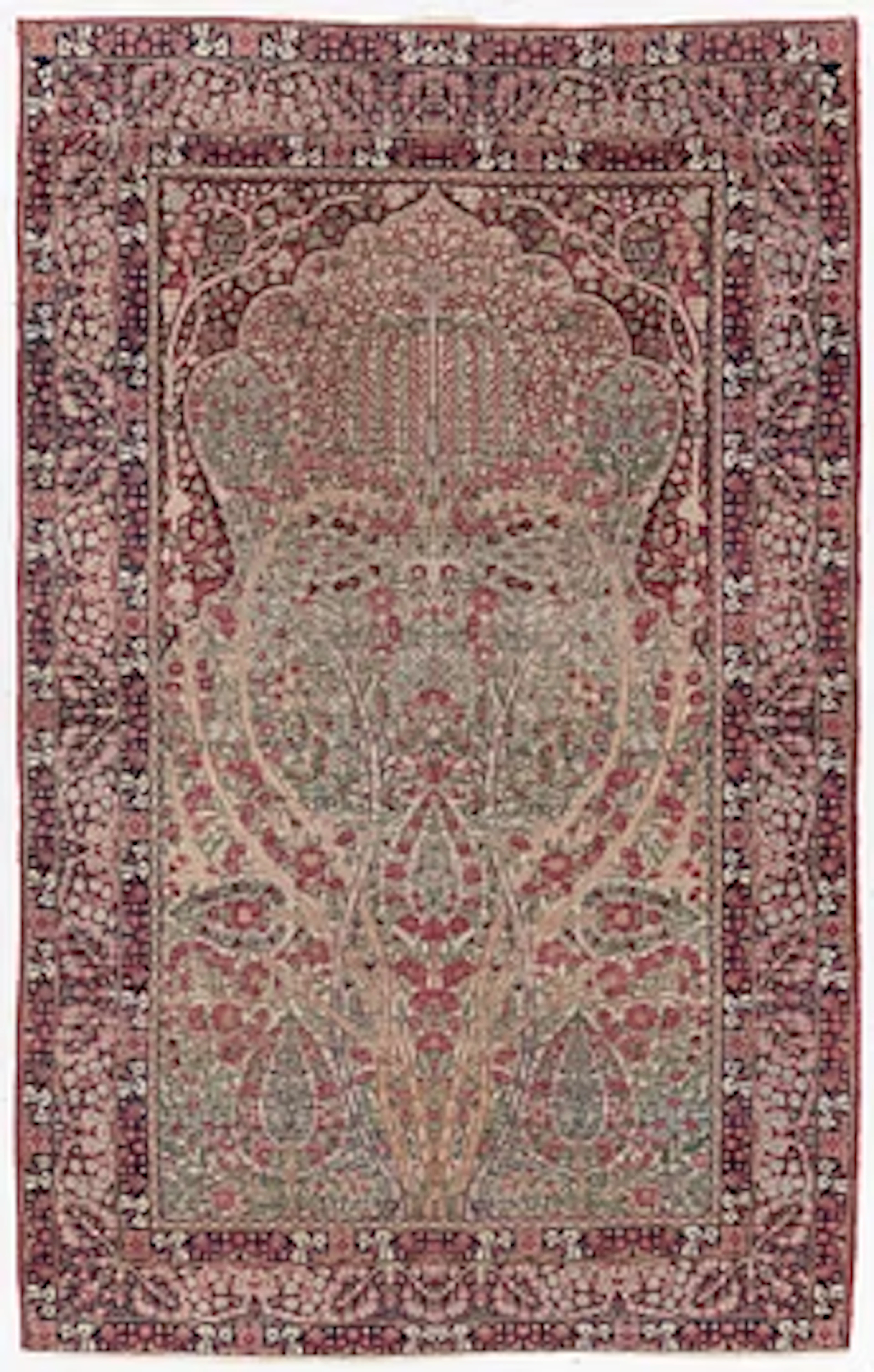 An antique Kirman rug, south Persia, c. 220 x 140 cm.