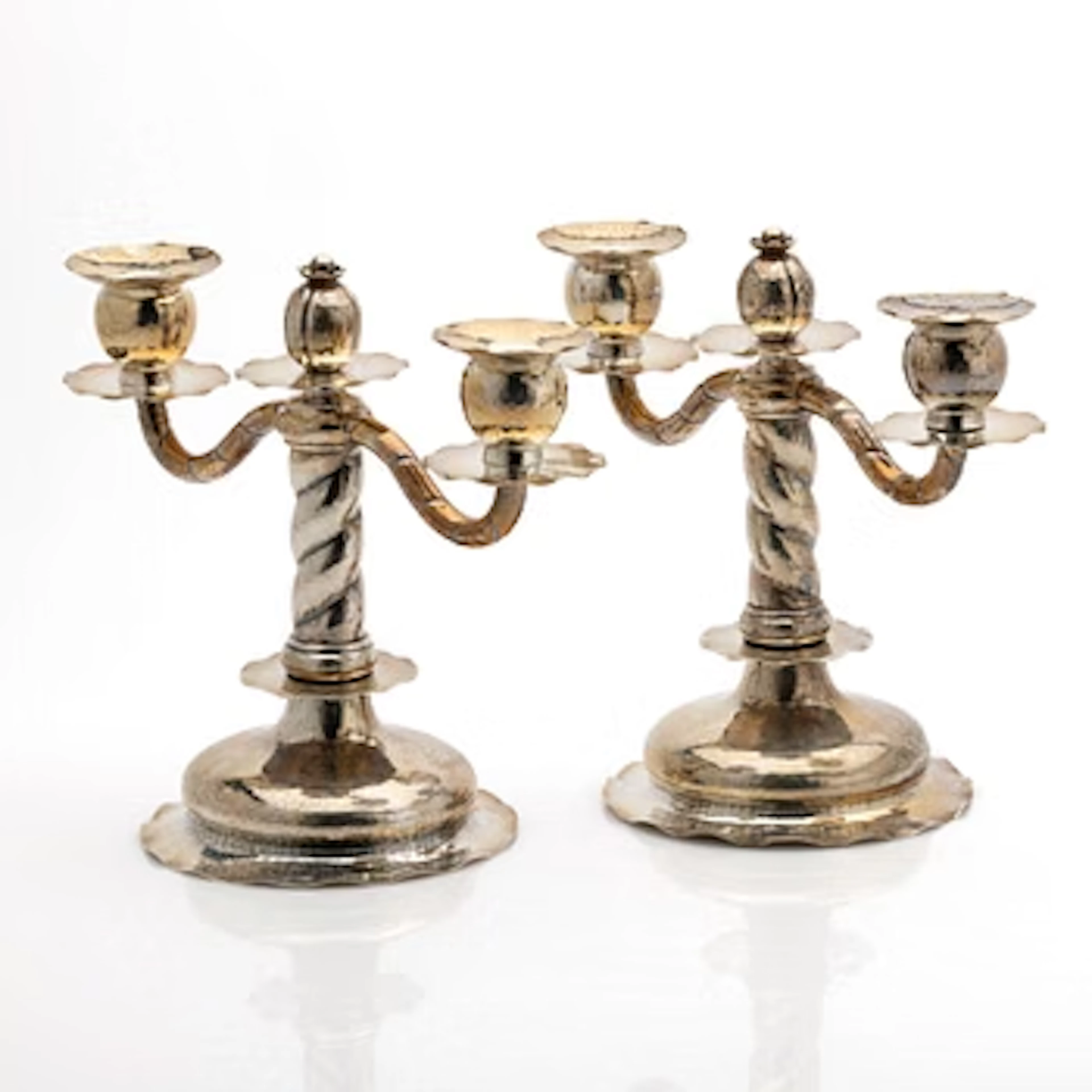 C.G. Hallberg, Pair of candelabra, silver, Stockholm, 1927.