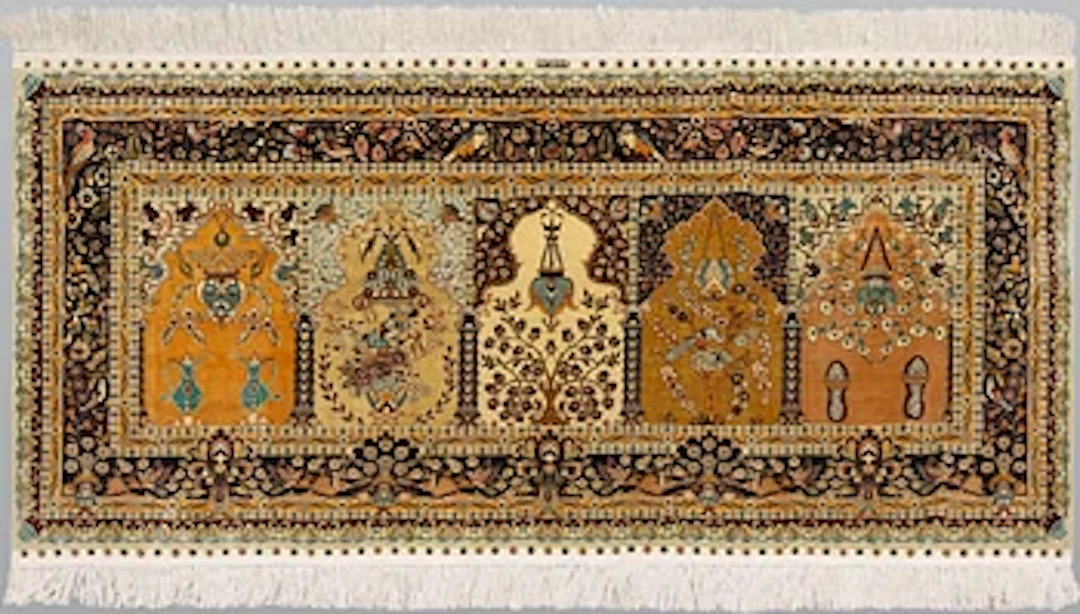 A Oriental silk rug, 182 x 89 cm.