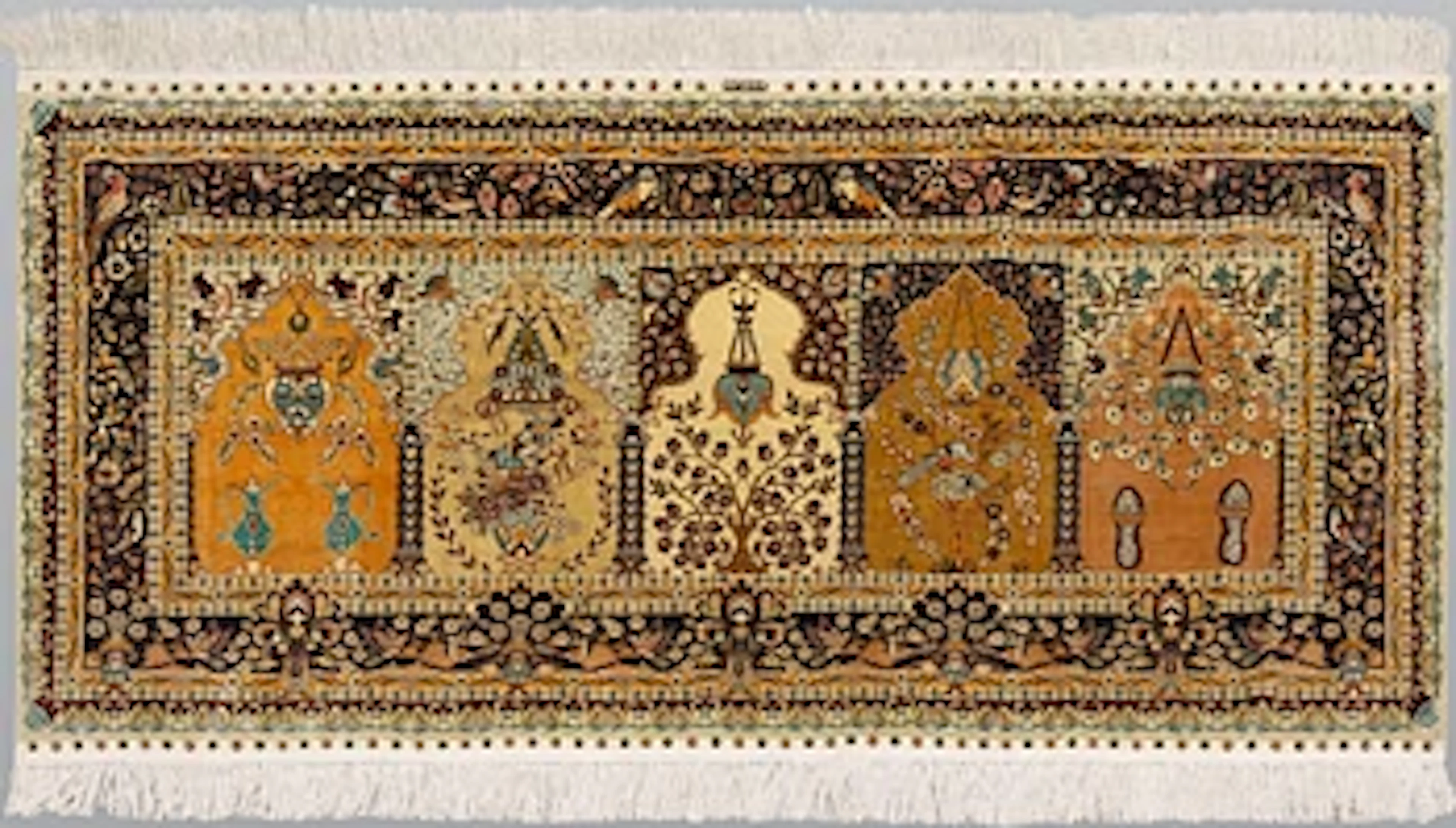 A Oriental silk rug, 182 x 89 cm.
