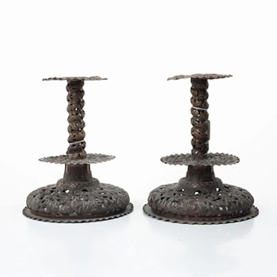 A pair of candlesticks. Copper, Baroque style, second half of the 19th century.