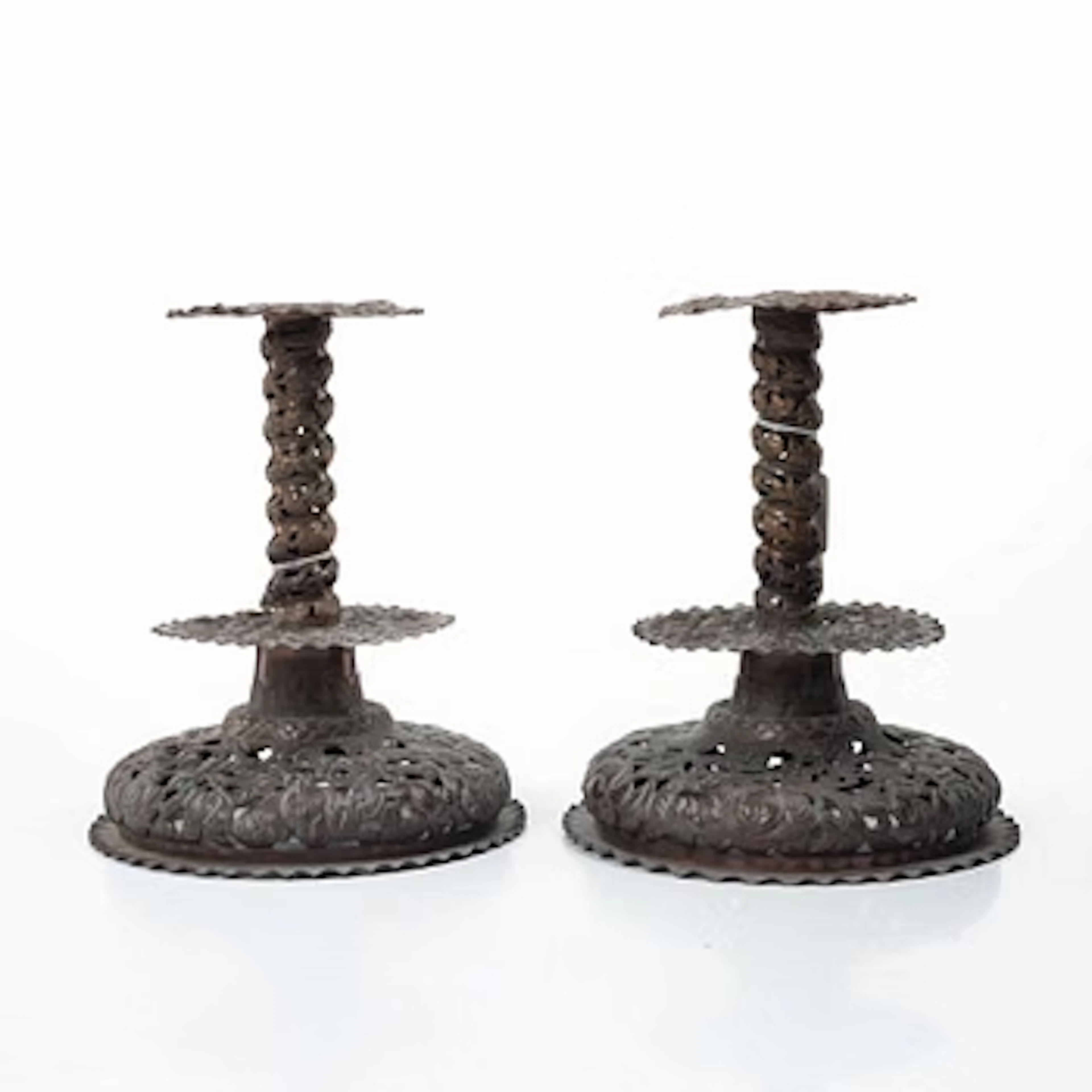A pair of candlesticks. Copper, Baroque style, second half of the 19th century.