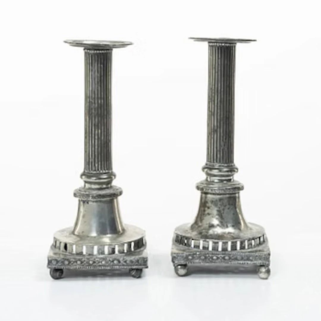 A pair of peuter candlesticks by Hans Wicksten (active between 1782-1810)
