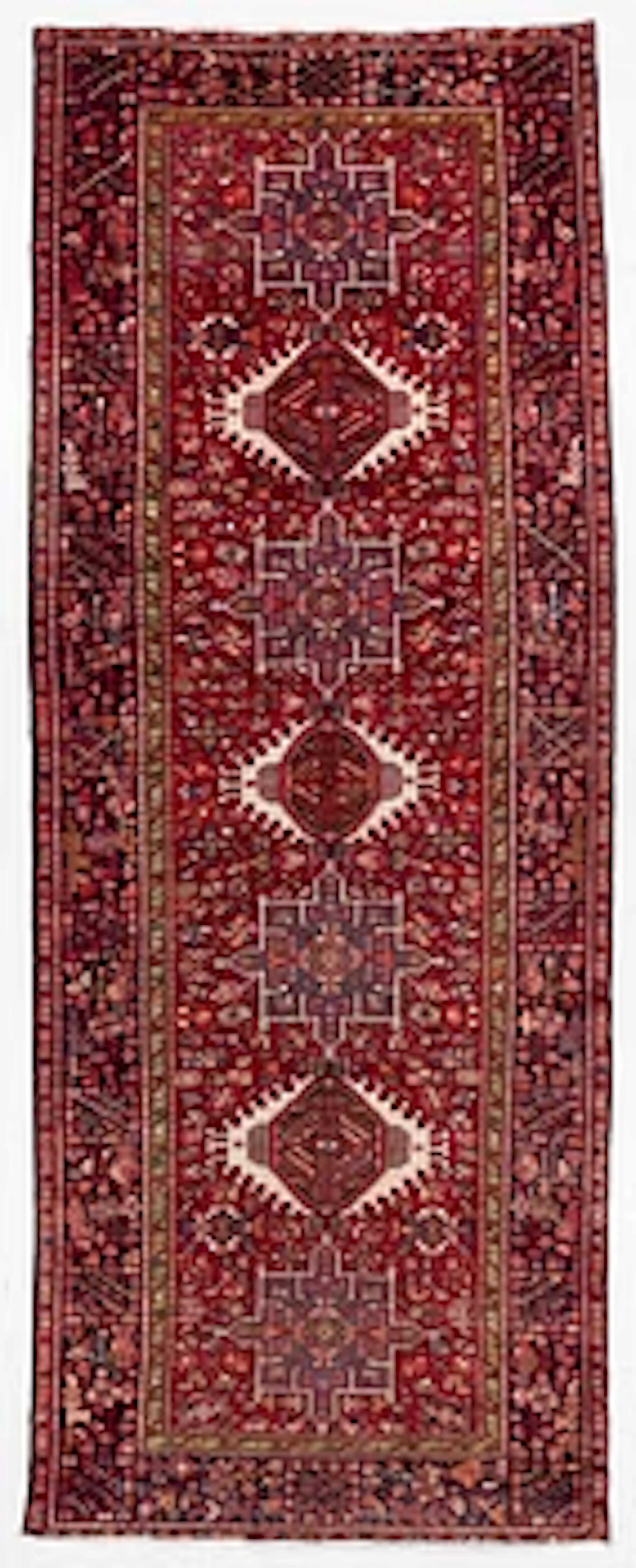 A semi-antique Karadja runner, c. 405 x 155 cm.