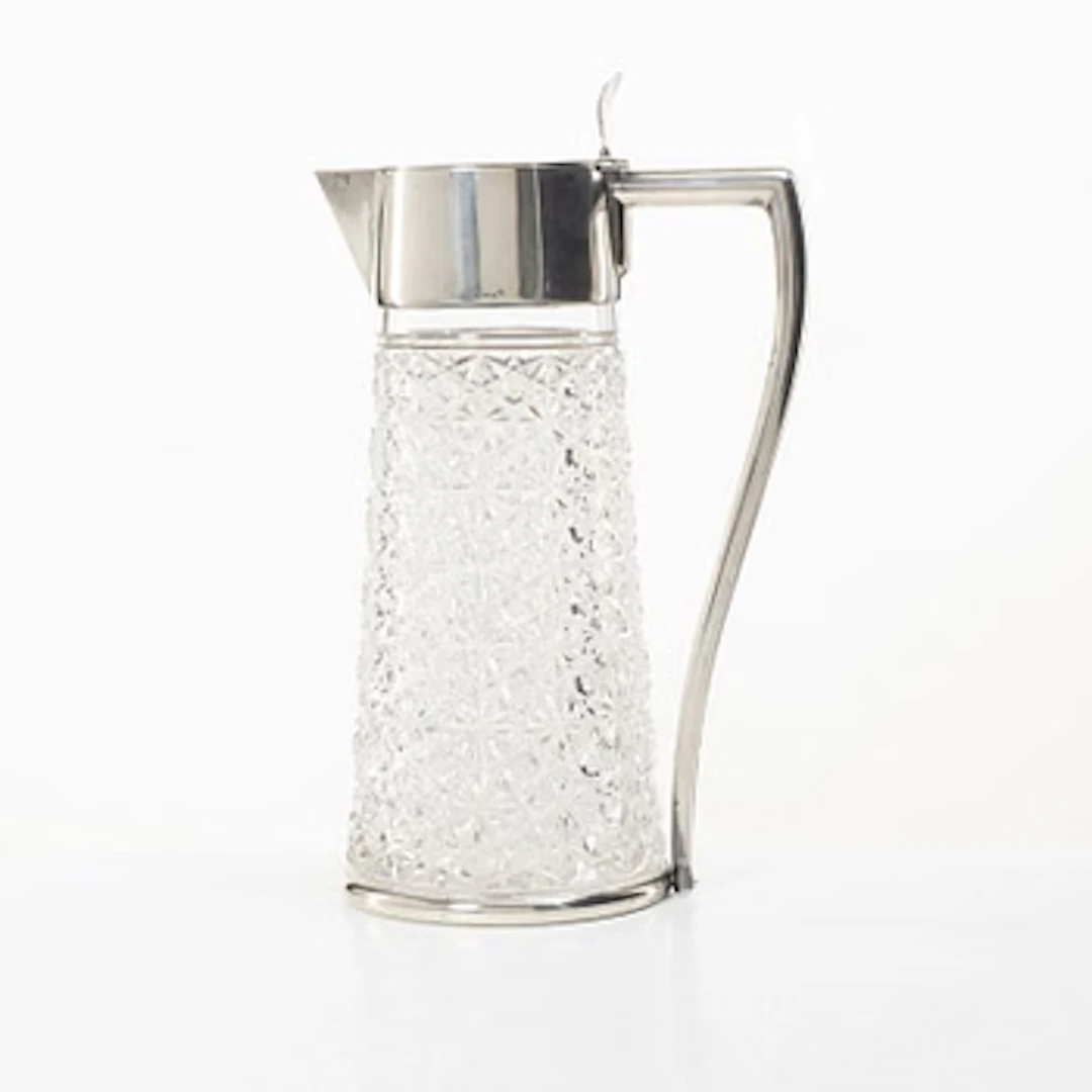 A glass and silver wine jug, CG Hallberg, Stockholm, 1901.