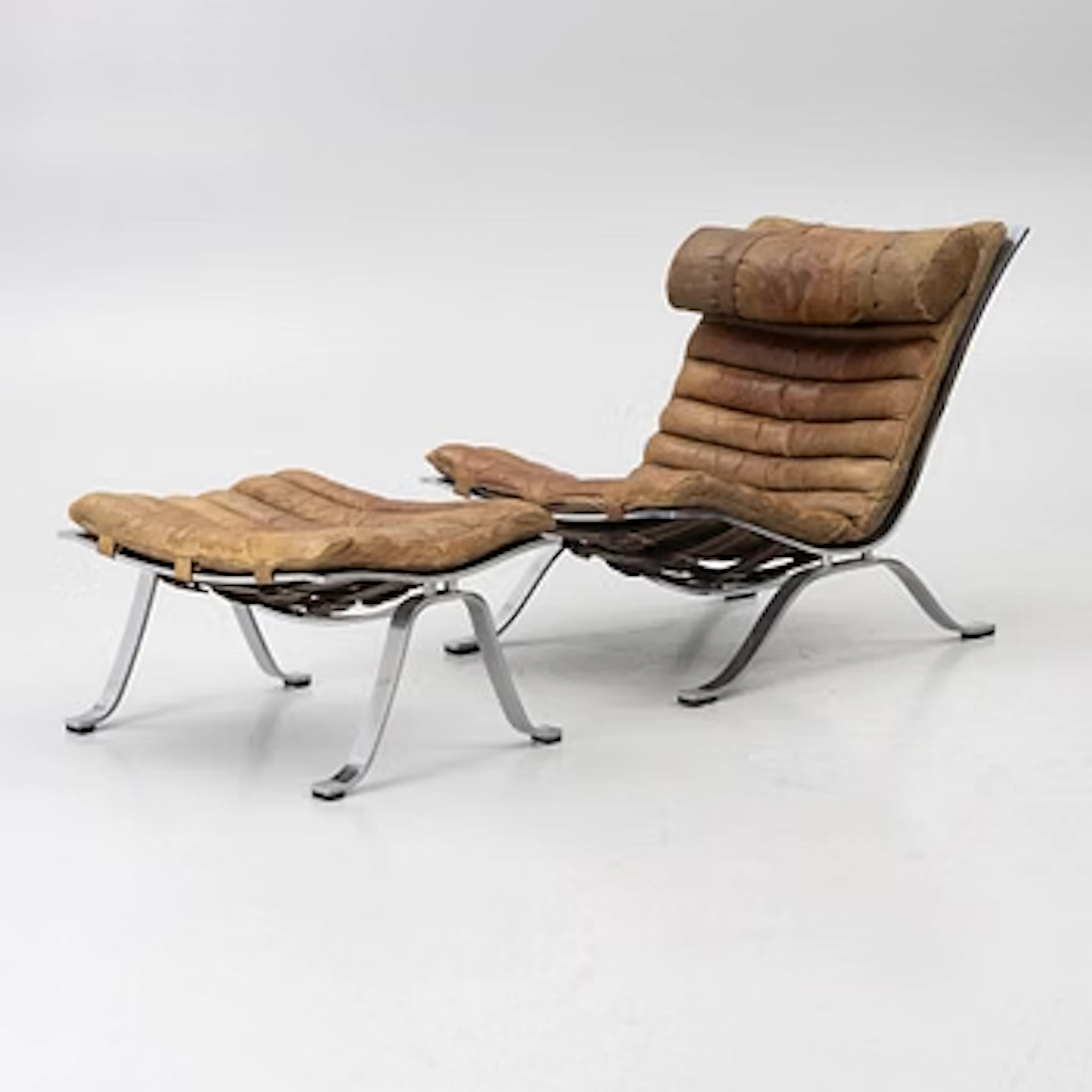 Arne Norell, An 'Ari' armchair with footstool, Norell Möbel, Aneby.