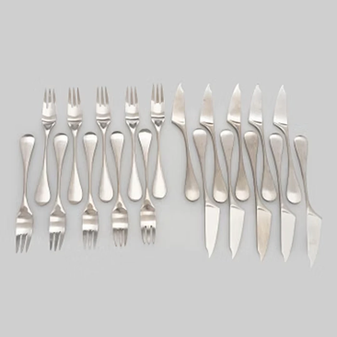 Nanny Still, 20-piece of 'Mango' steel cutlery for Hackman Finland.