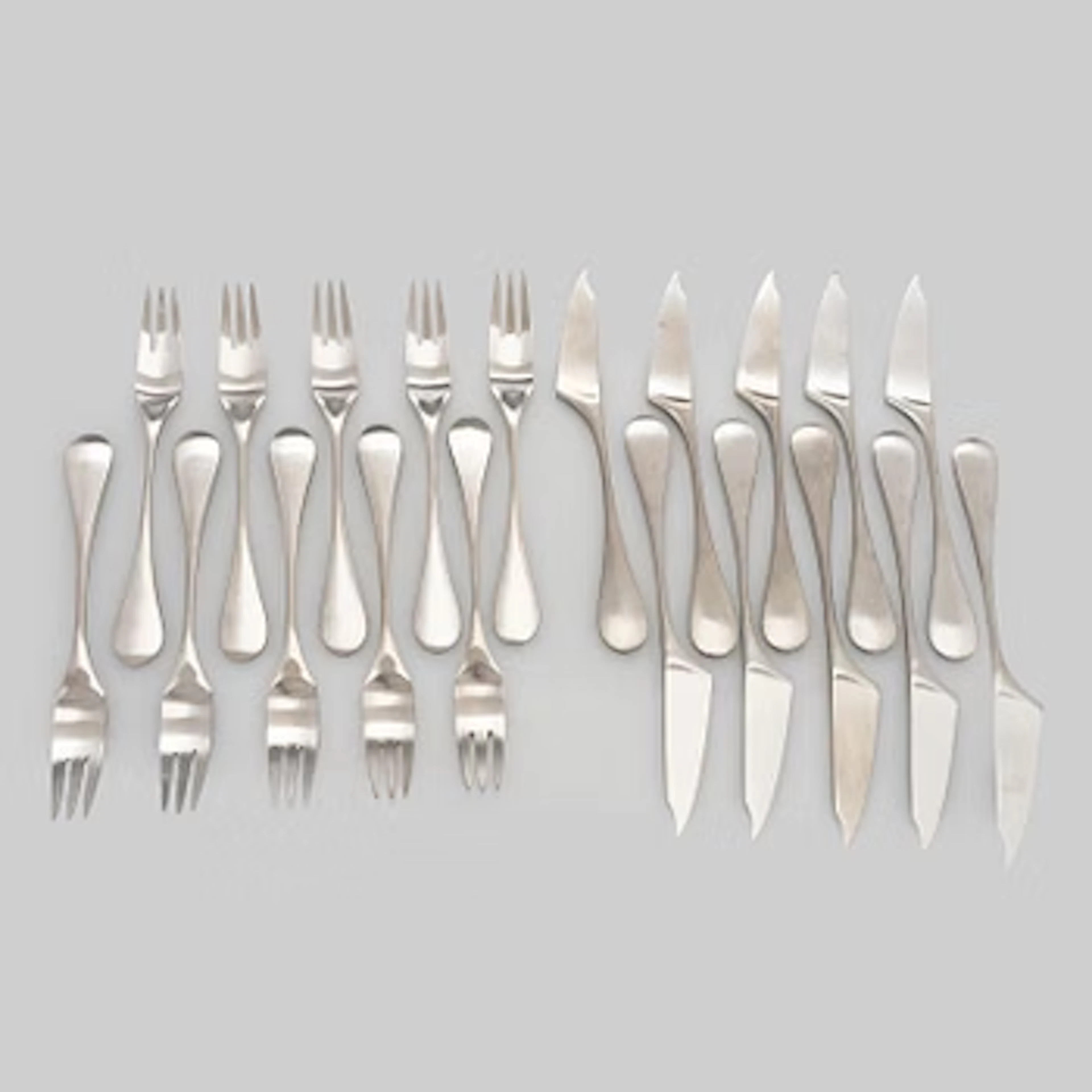 Nanny Still, 20-piece of 'Mango' steel cutlery for Hackman Finland.