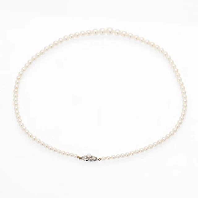 Necklace of graduated cultured pearls with a silver clasp.