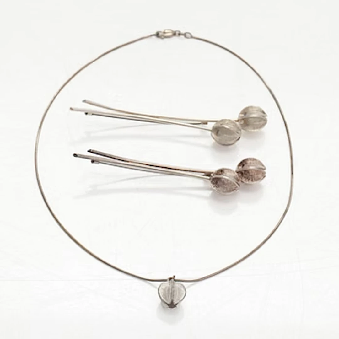 Marja Suna, brooches and pendant, “Snow flower”, silver, Kalevala Koru.