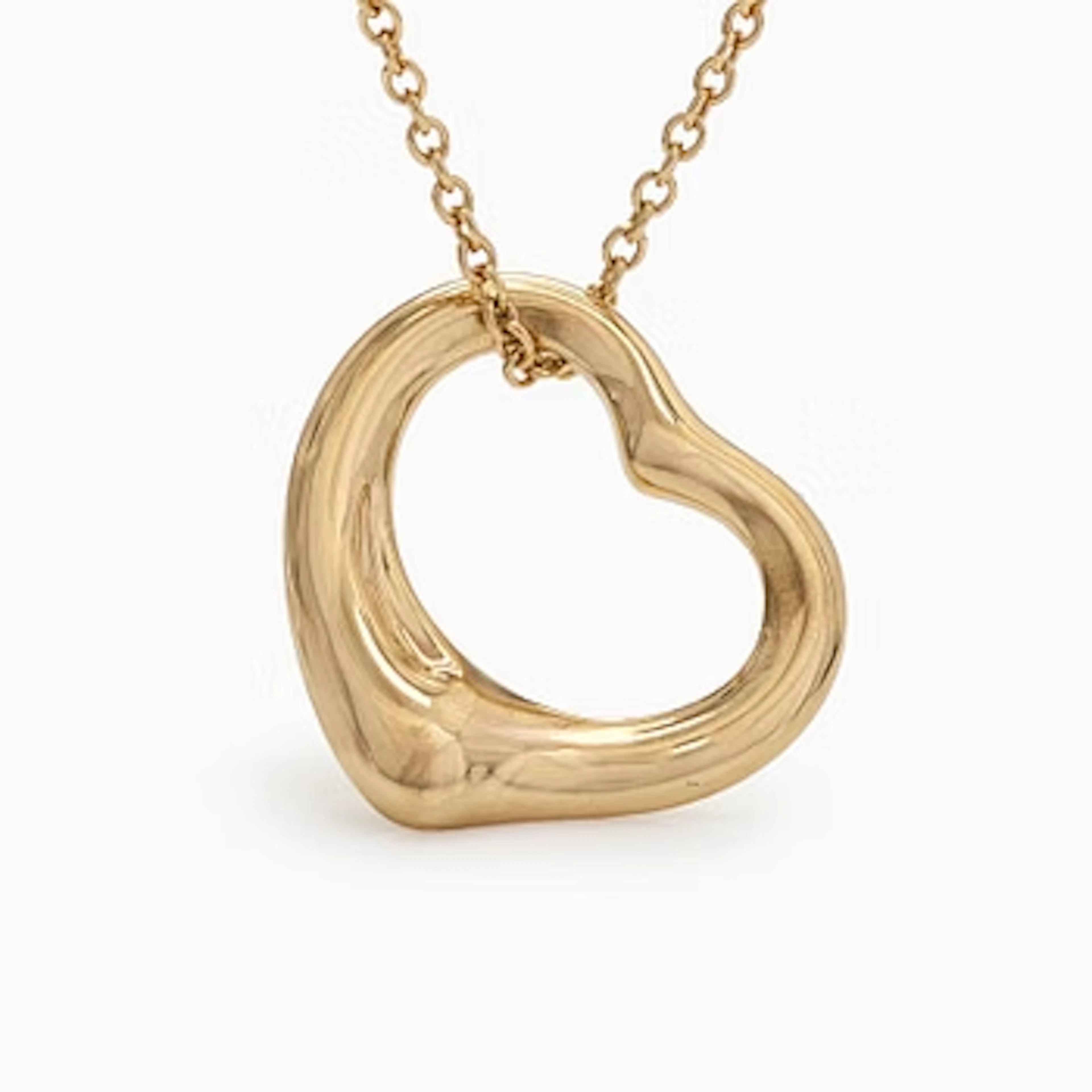 Tiffany & Co, Elsa Peretti, an 18K gold "Open Heart" necklace.