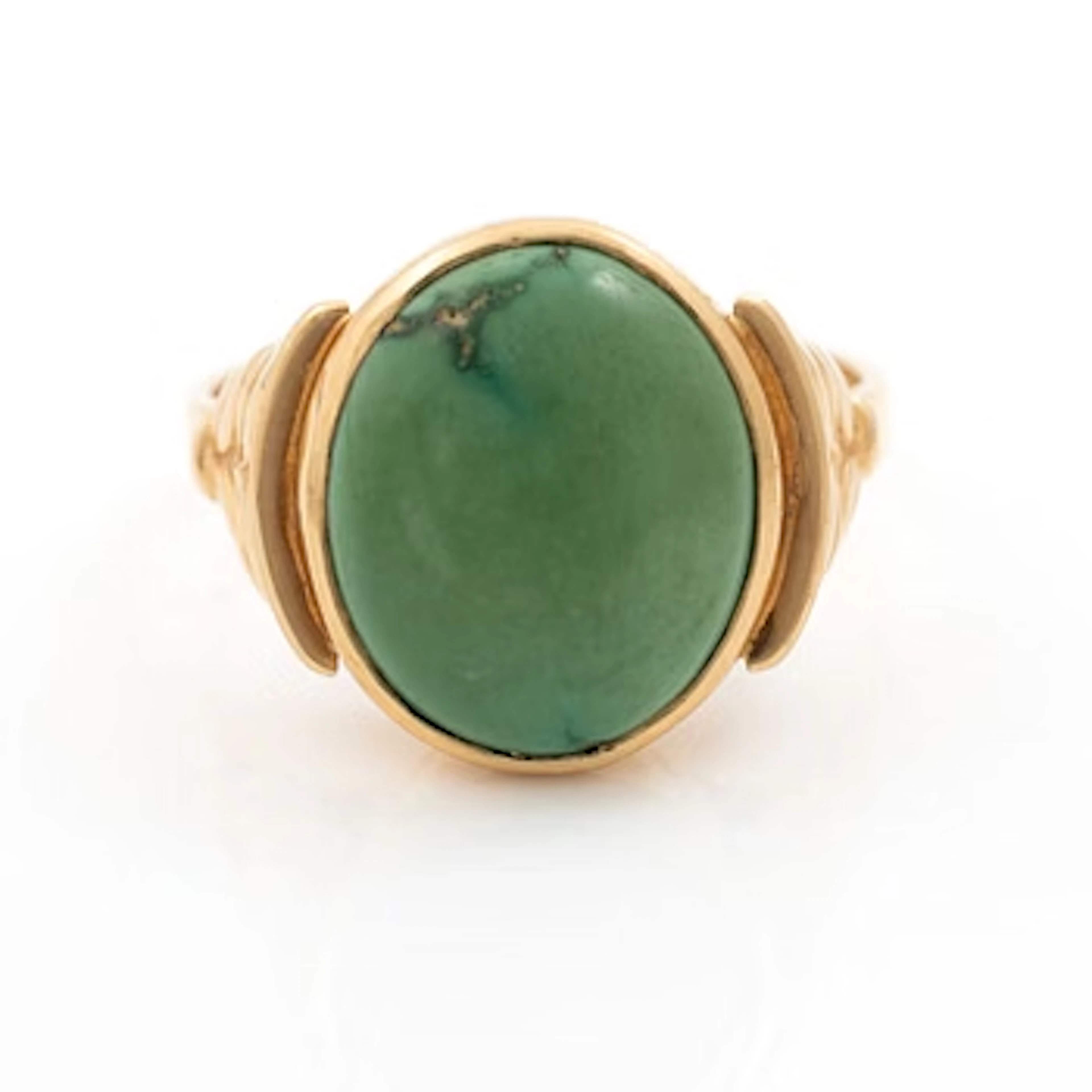 18K gold ring with green stone.