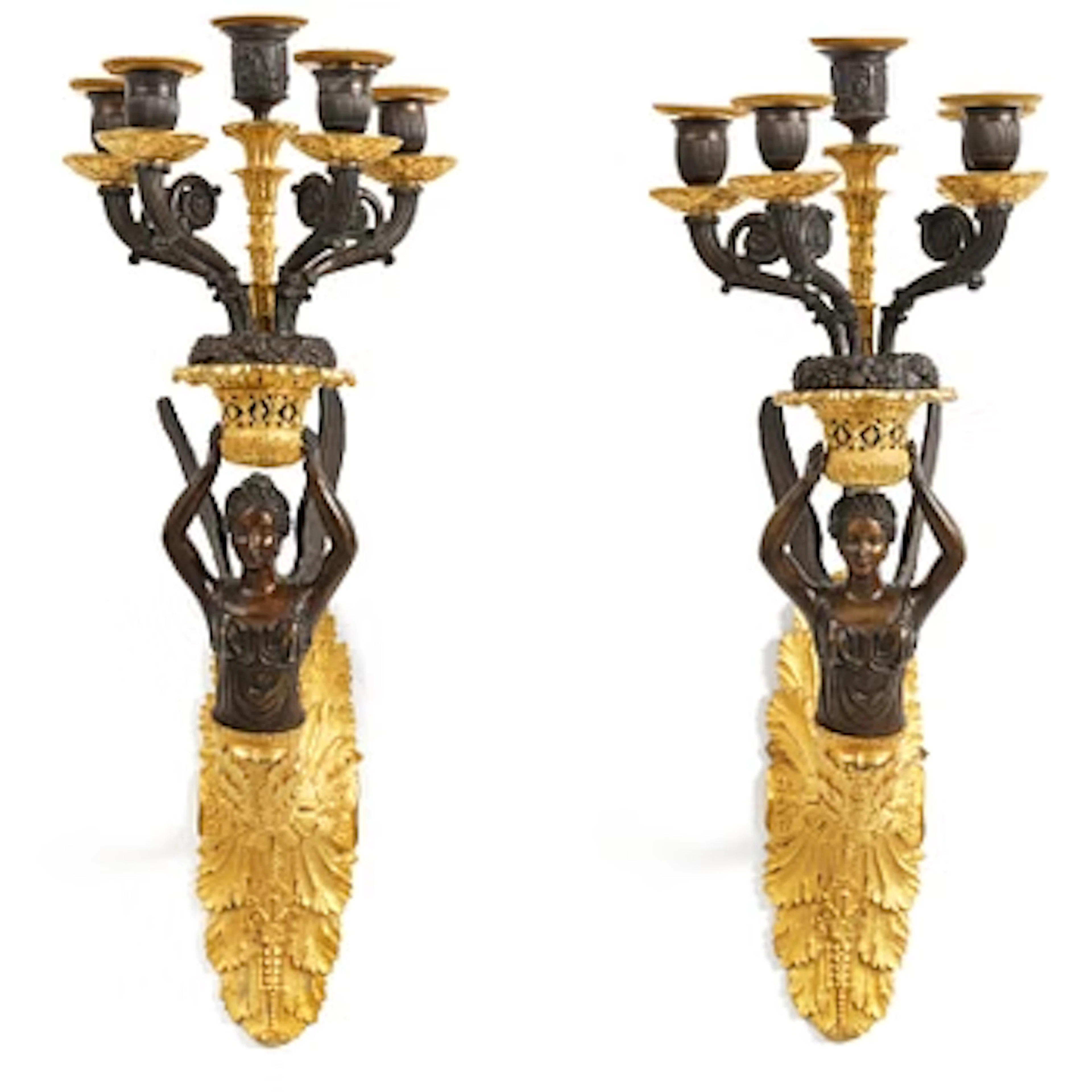 A pair of French Empire five-branch gilt and patinated bronze appliques