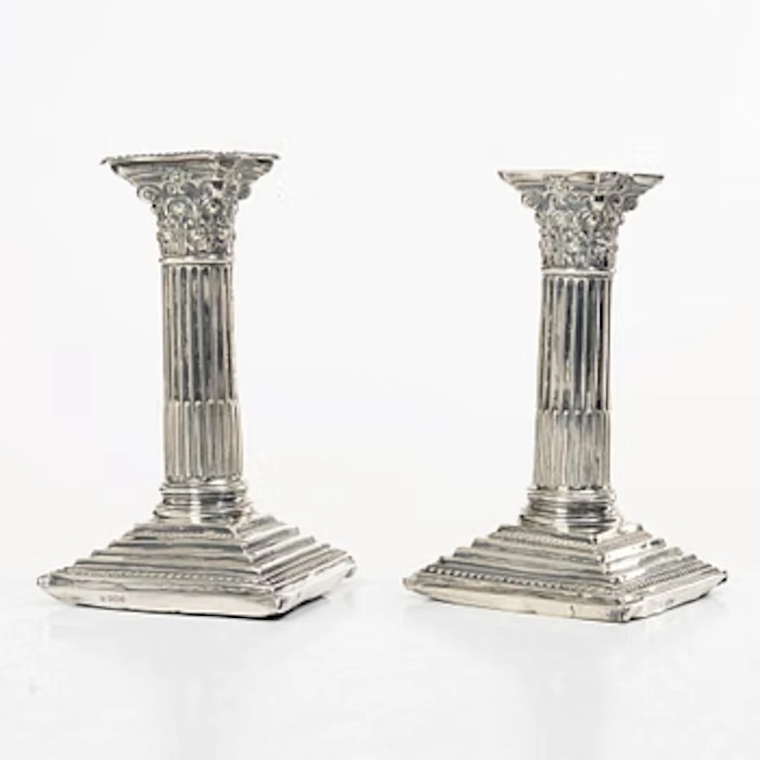 A pair of English silver column candlesticks, mark of Walter Latham