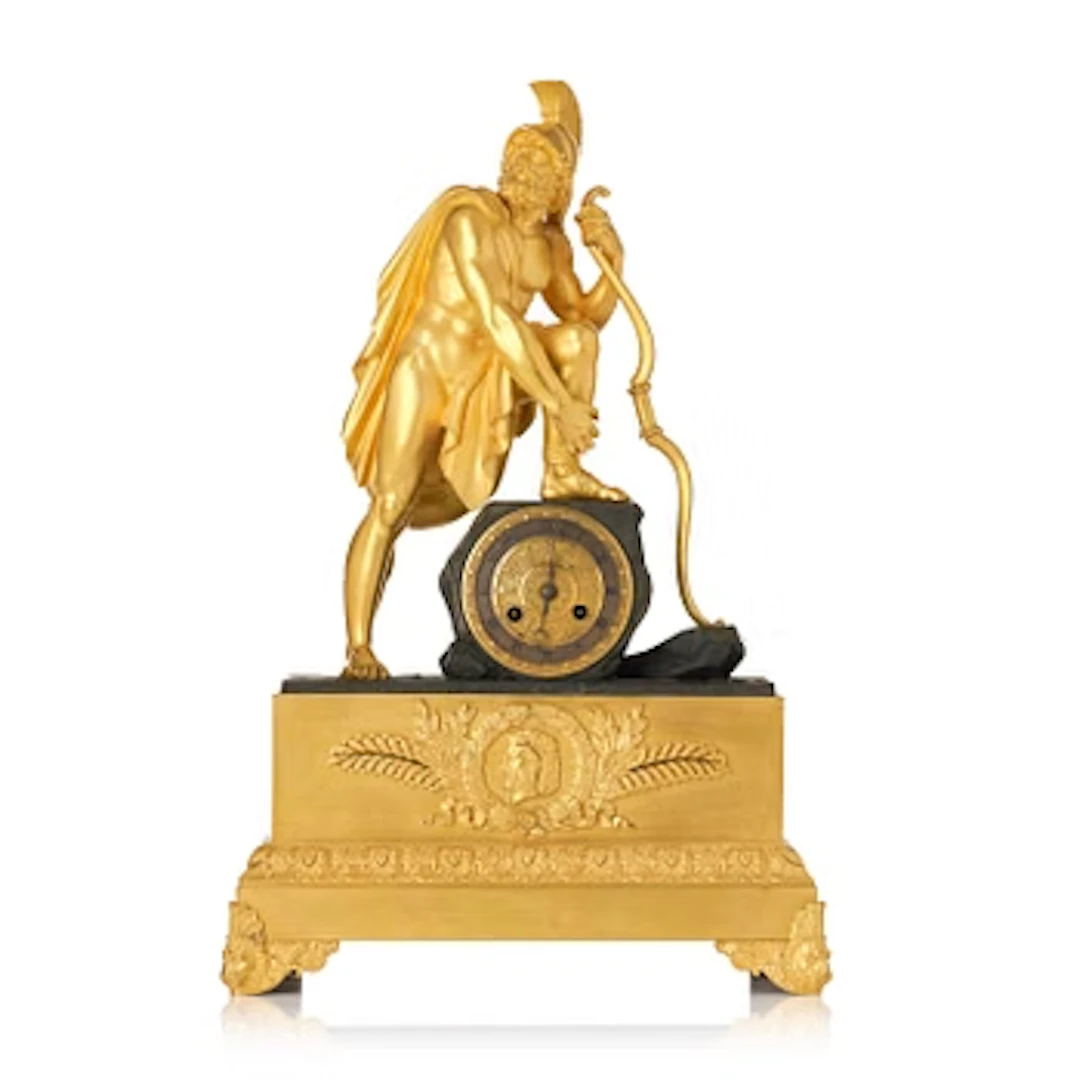A French Empire ormolu and patinated bronze figural mantel clock