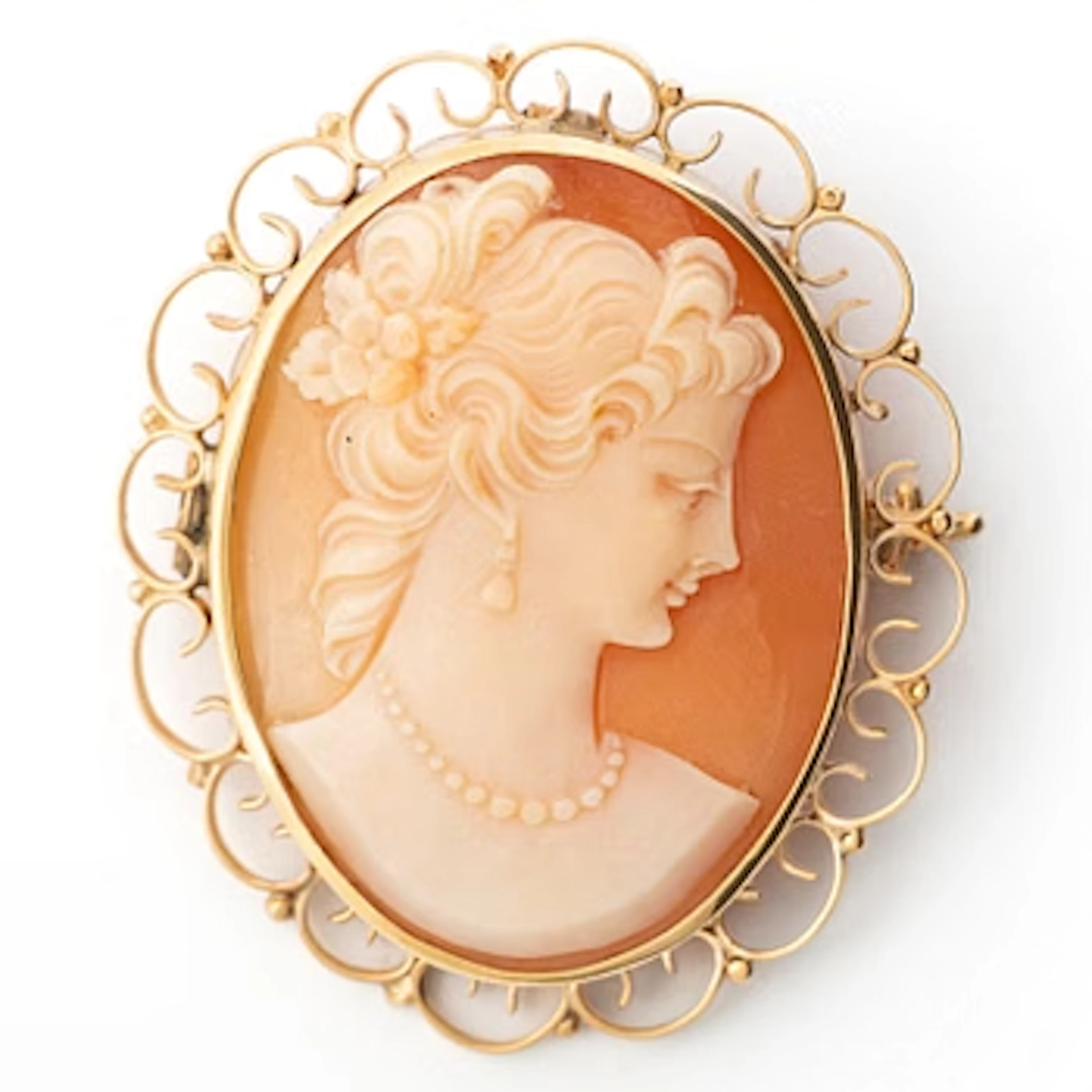 Brooch/pendant in 18K gold with a shell cameo, 1950s.
