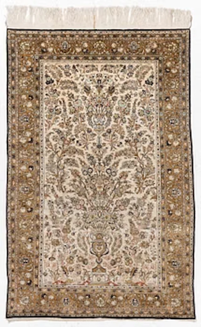 A Ghom, silk rug, c. 215 x 140 cm.