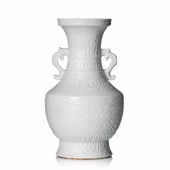 A blanc de chine 'lotus' vase, Qing dynasty 18/19th century.