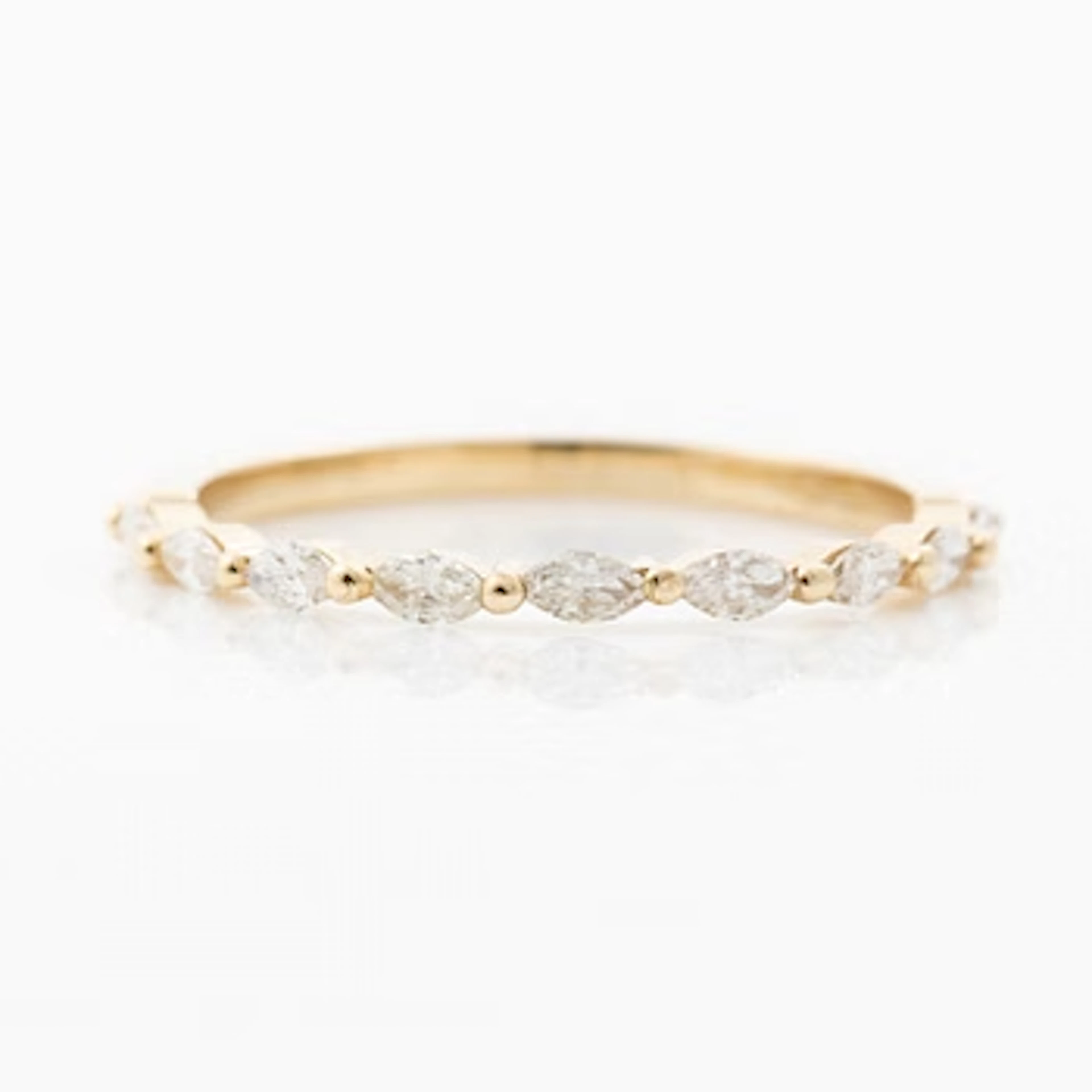 14K gold ring with marquise-cut diamonds.