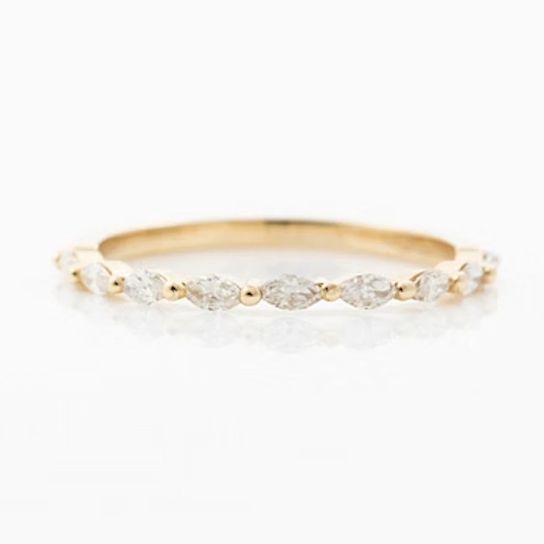 14K gold ring with marquise-cut diamonds.