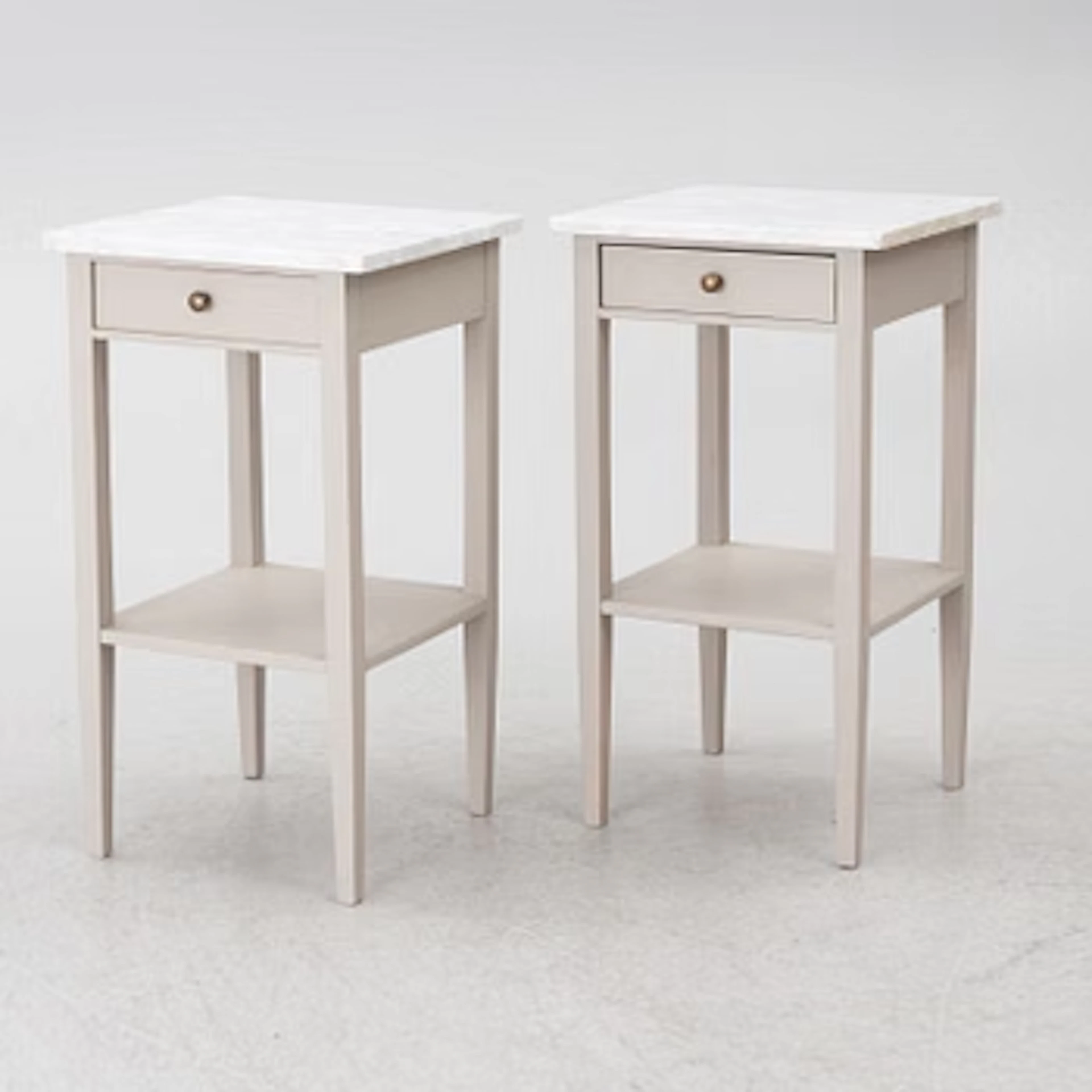 A pair of contemporary bedside tables.