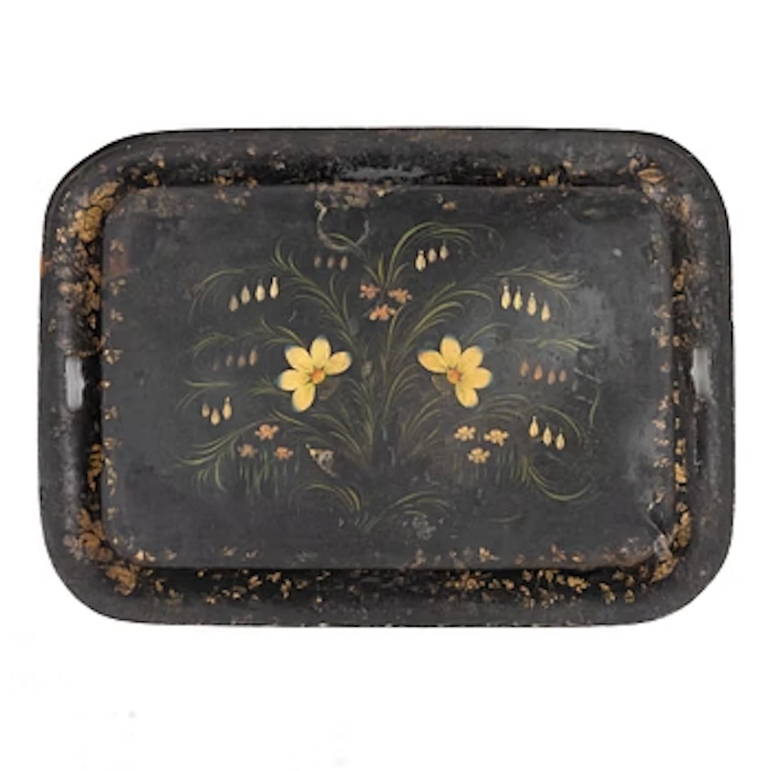A tin tray, mid-19th century.