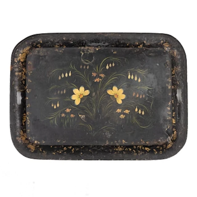 A tin tray, mid-19th century.
