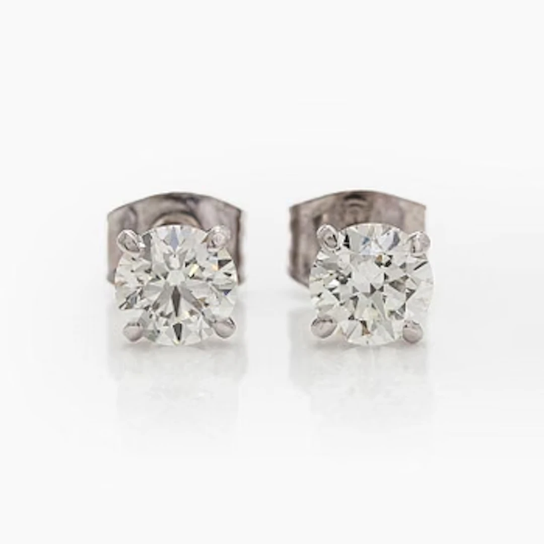 Earrings, brilliant cut diamonds totalling 1.20 ct, 14K white gold.