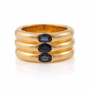 A Cartier ring "Ellipse" 18K gold with faceted sapphires.