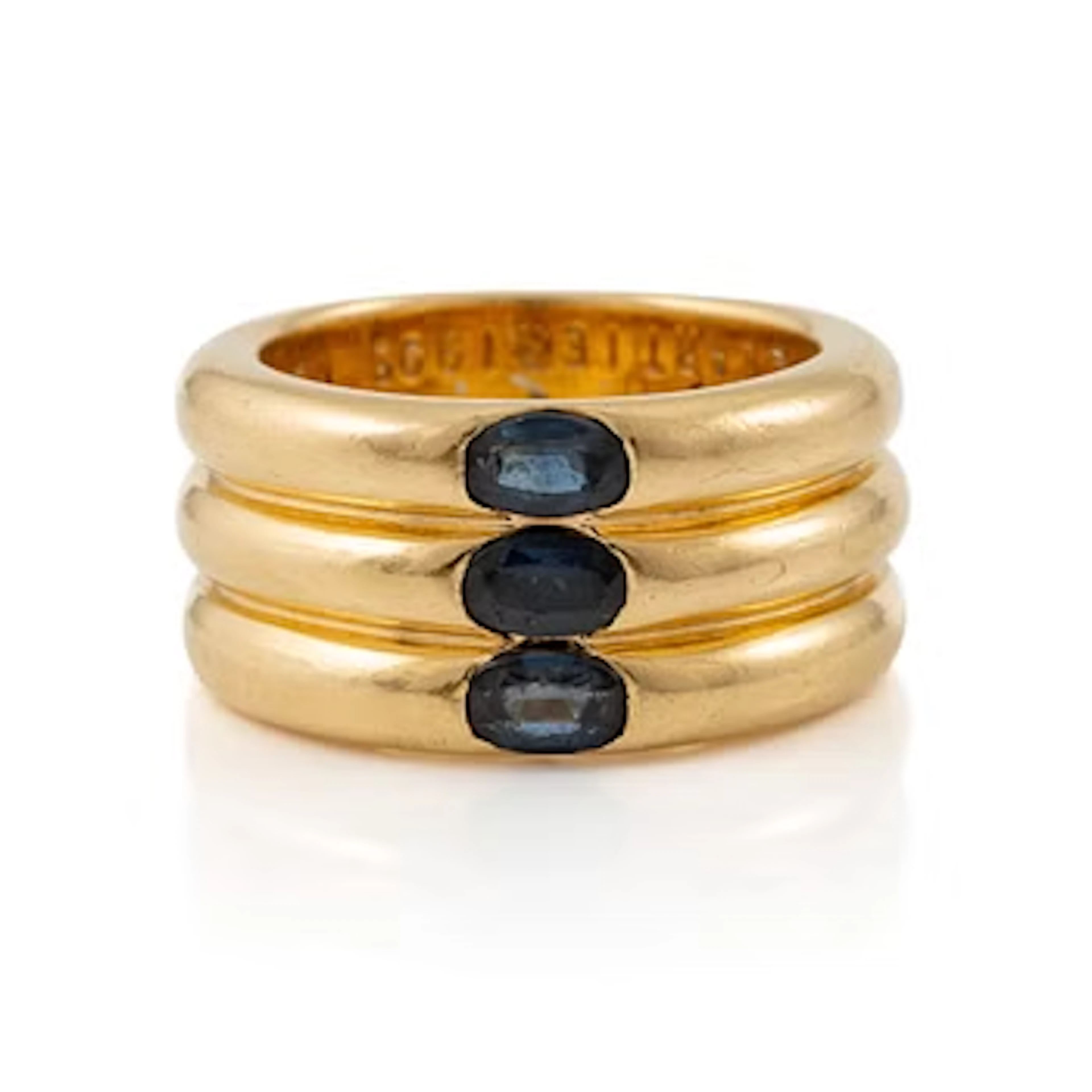 A Cartier ring "Ellipse" 18K gold with faceted sapphires.