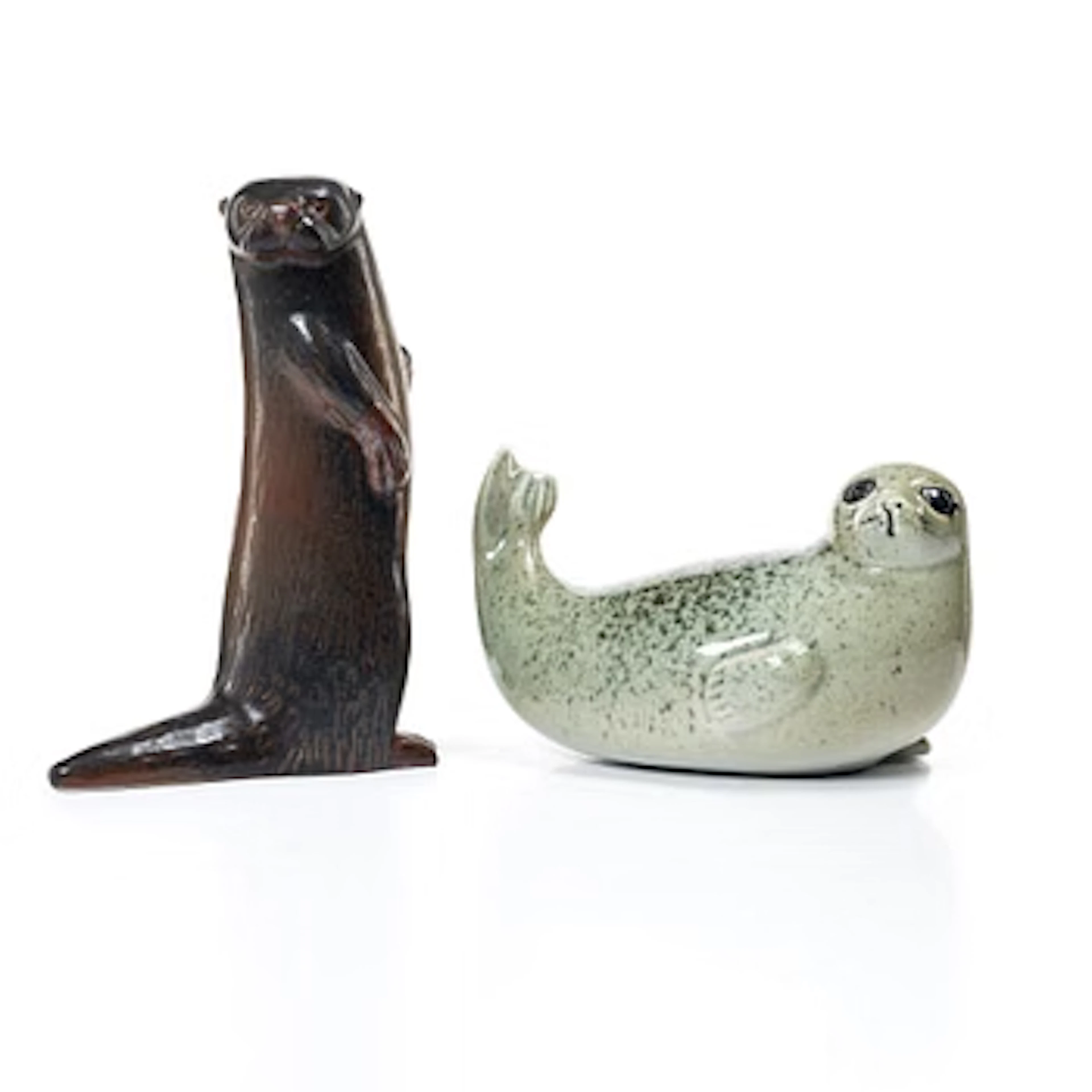 Lisa Larson, a 'Säl' and 'Utter' figurine, Gustavsberg for NK, Nordiska