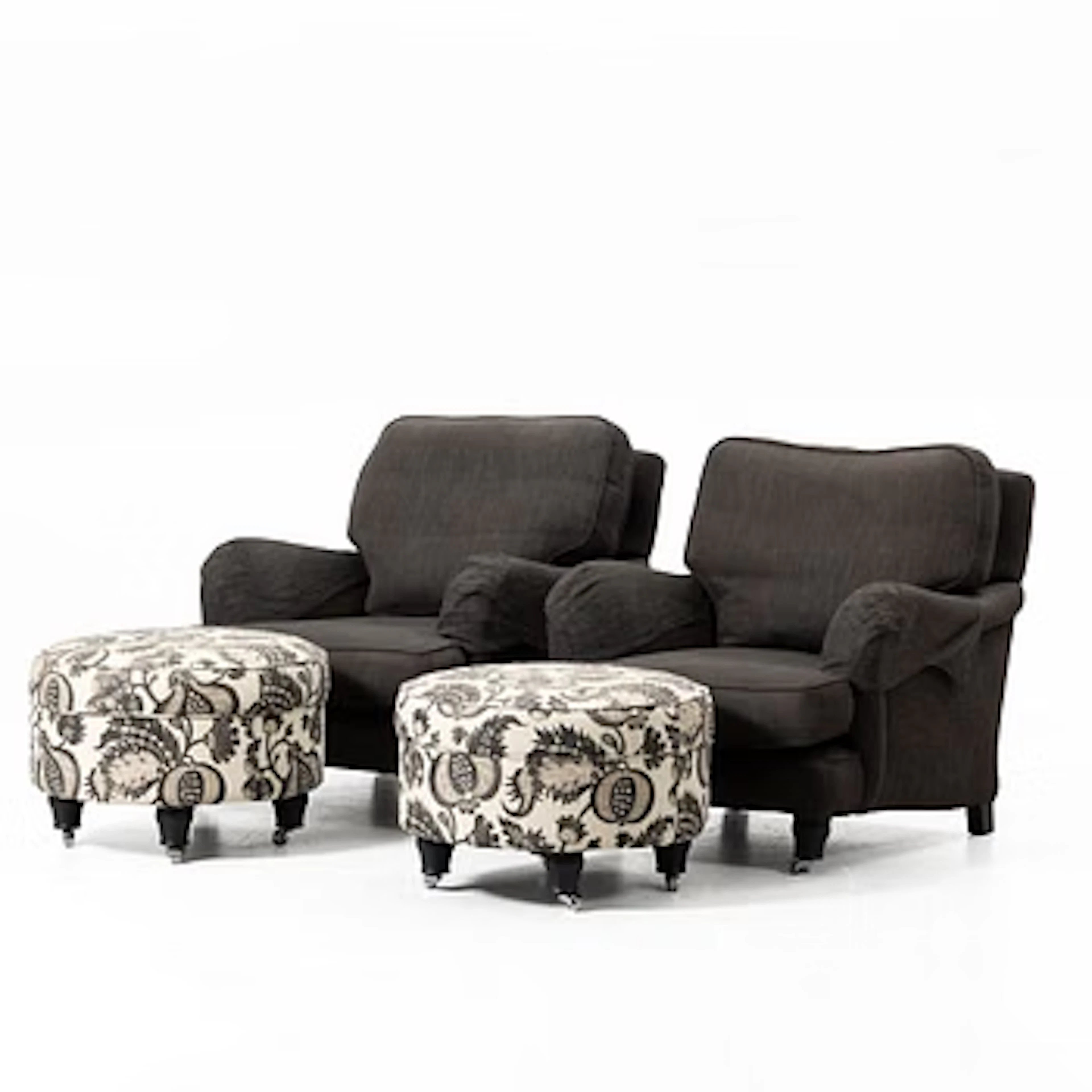 A pair of Howard-style armchairs with footstools, Englesson.