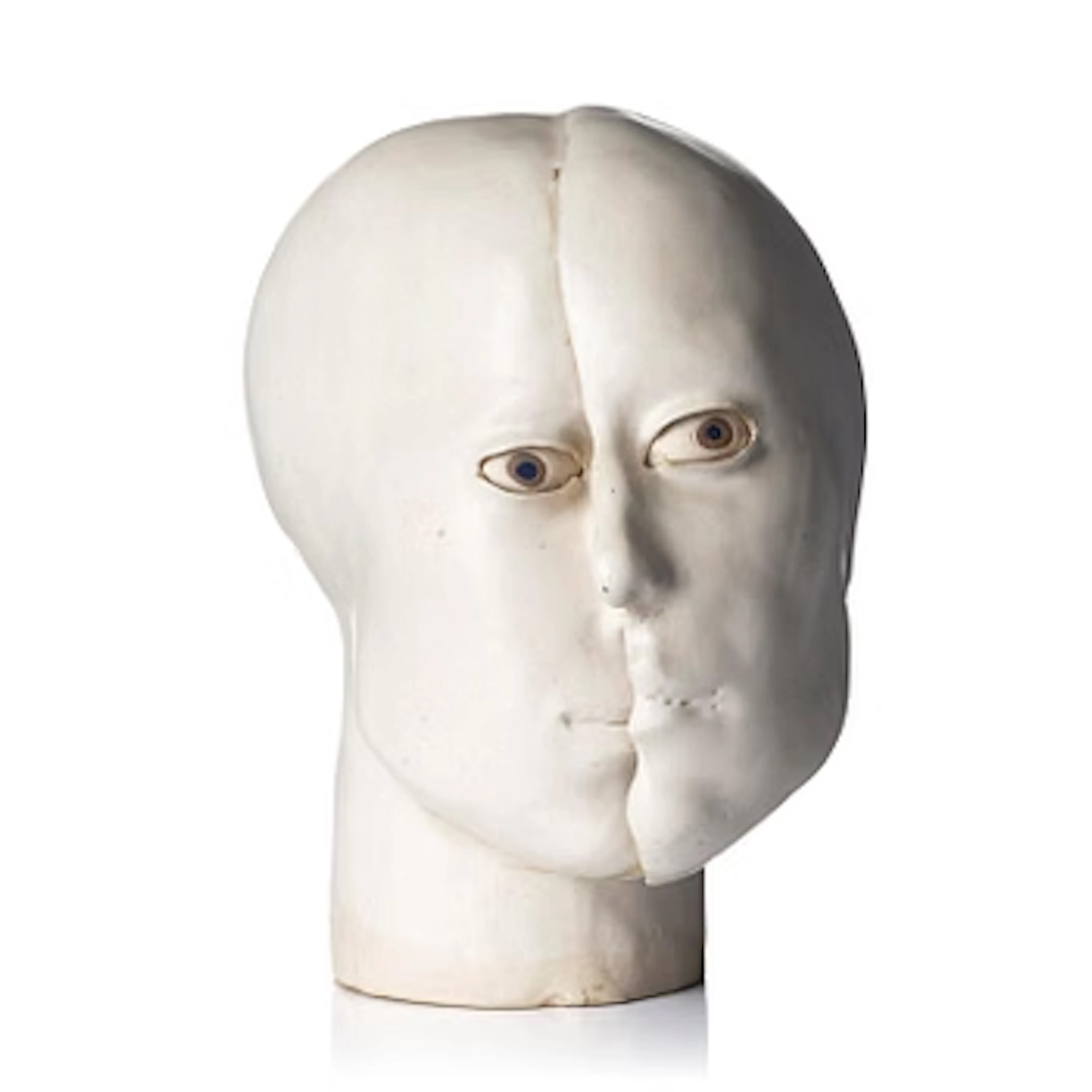 Britt-Ingrid "BIP" Persson, a glazed stoneware sculpture of faces, ca. 1970.
