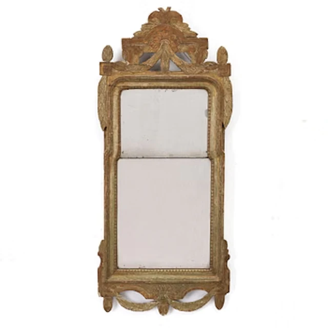 A Gustavian giltwood mirror, Stockholm, late 18th century.