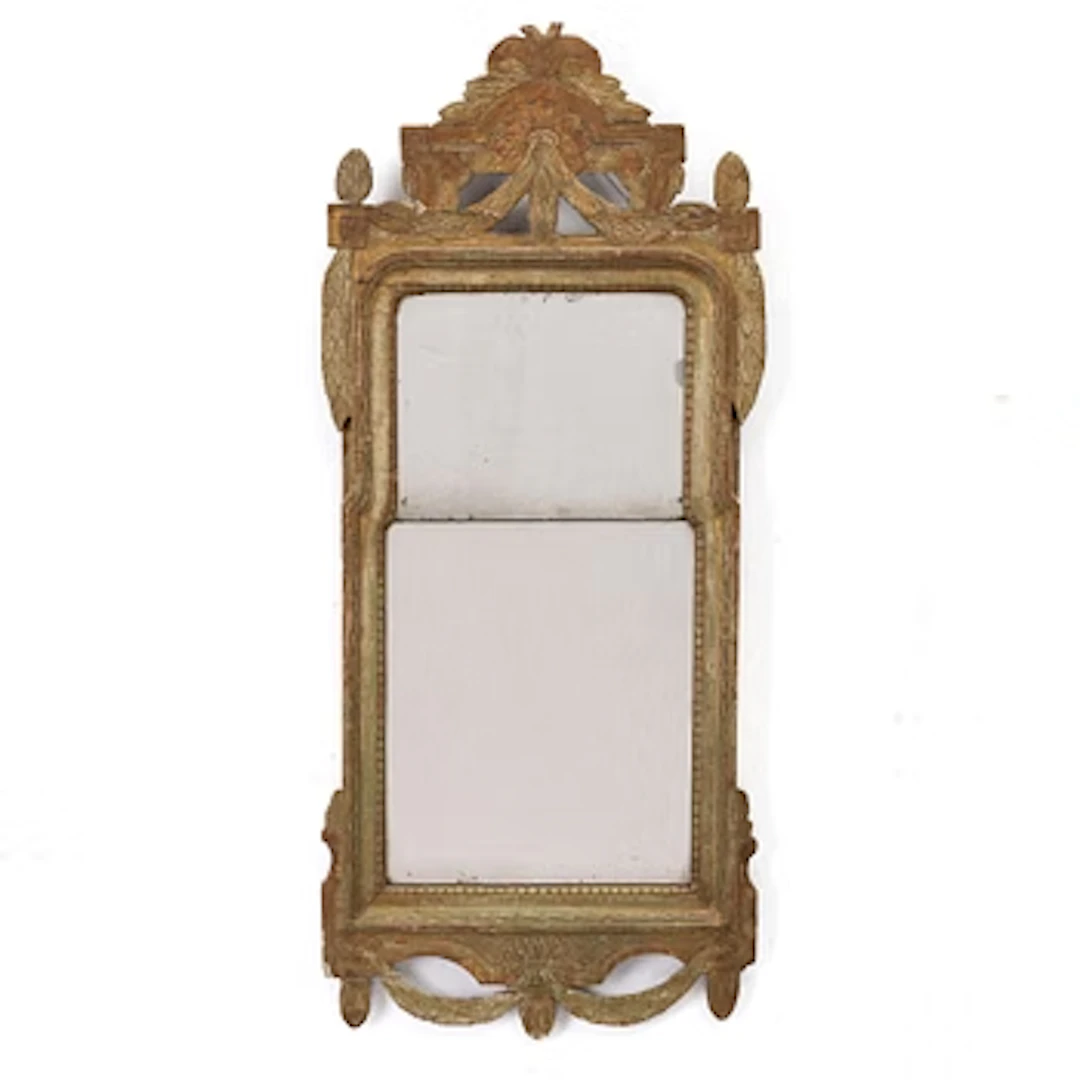 A Gustavian giltwood mirror, Stockholm, late 18th century.