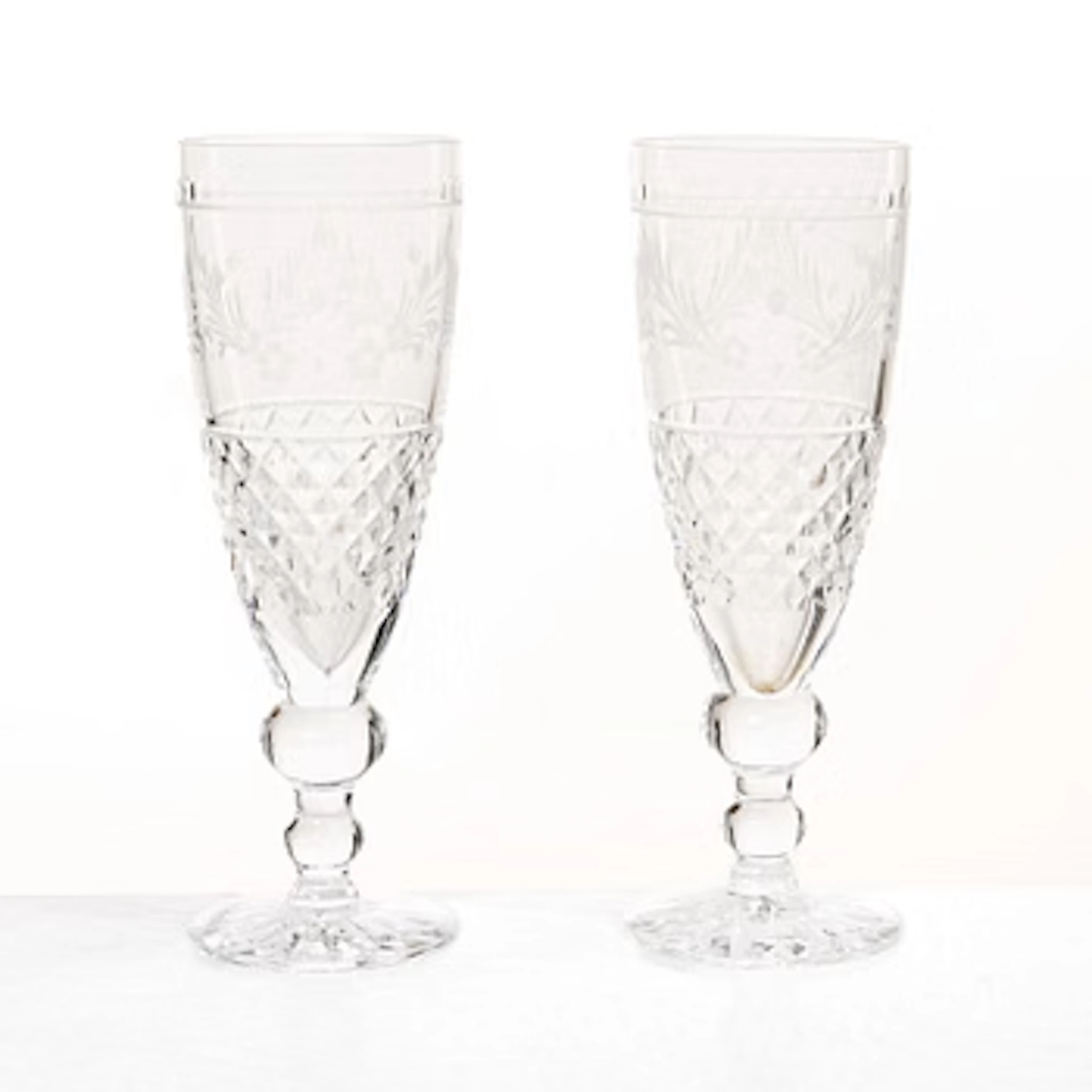 A set of seven "Elvira Madigan" champagne flutes by Kosta.