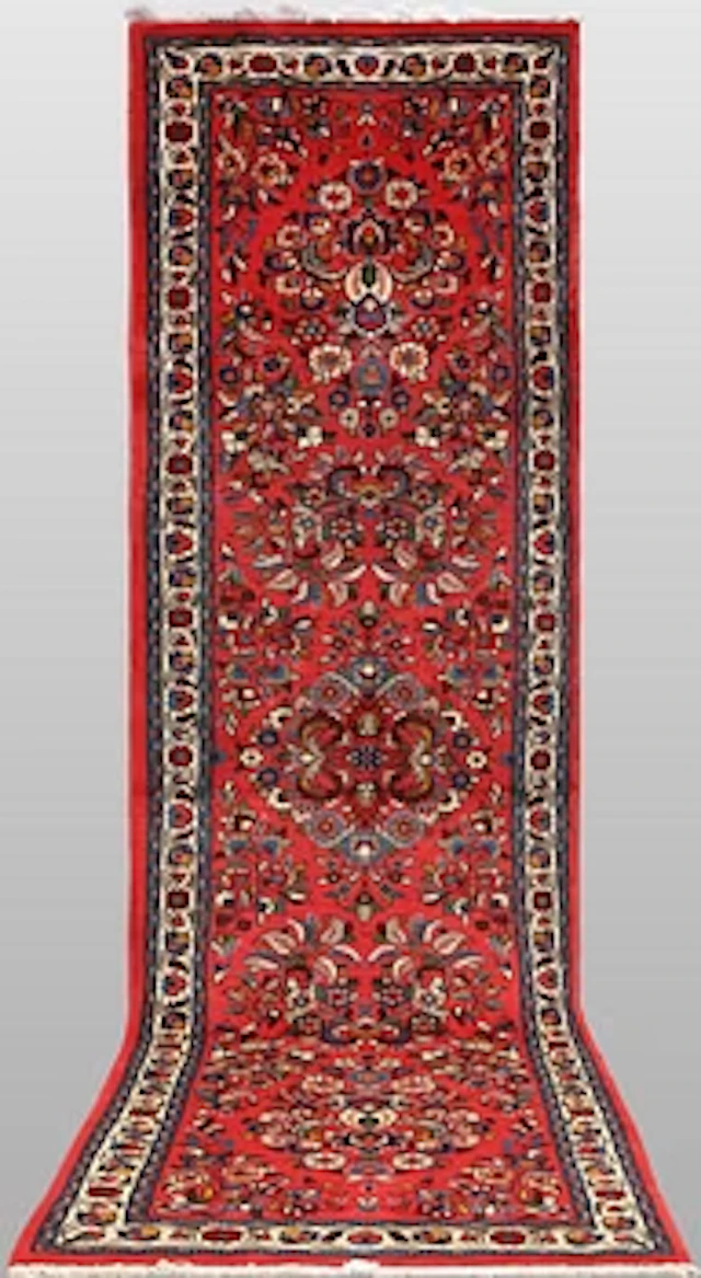 A Saruk runner carpet, 310 x 84 cm.