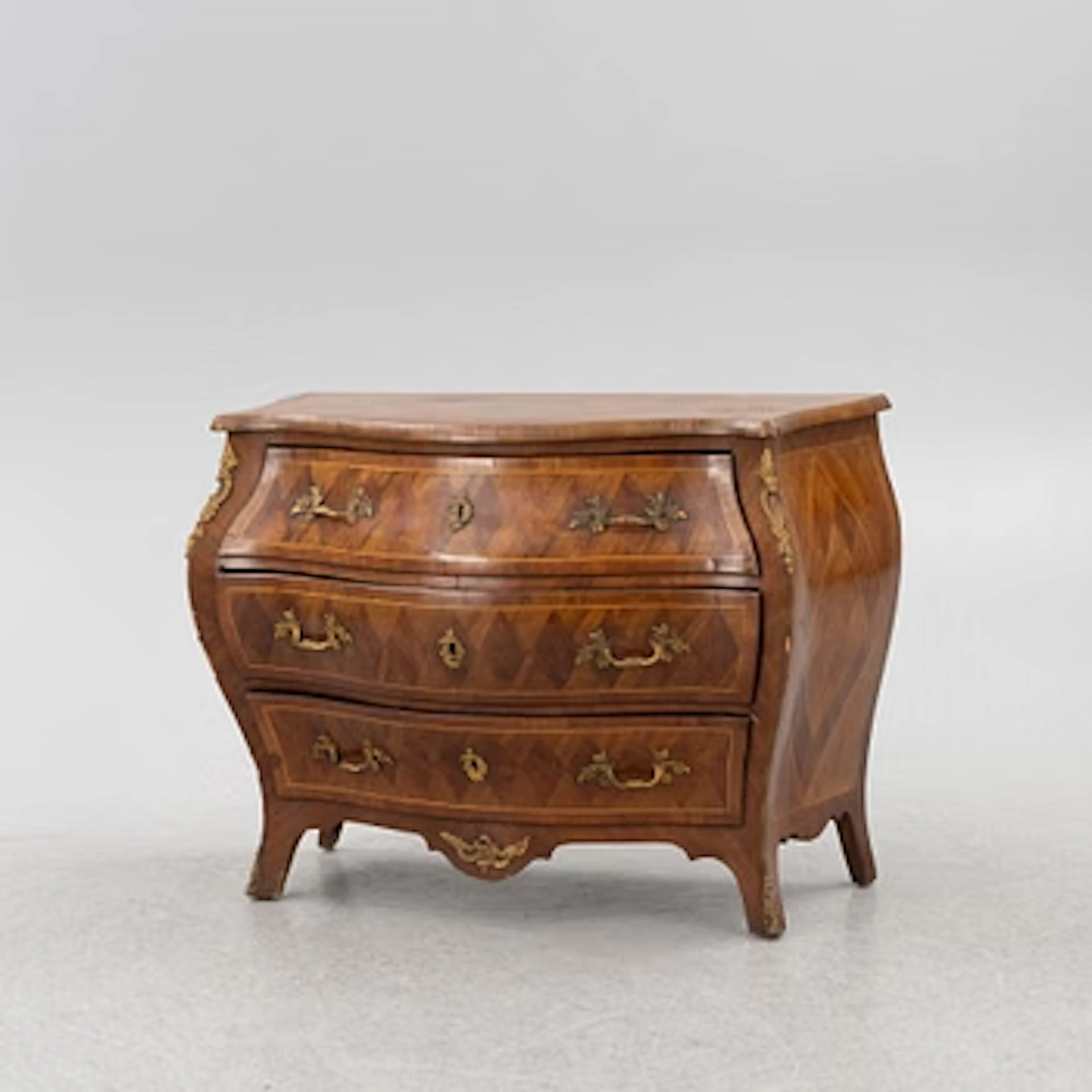 A Rococo chest of drawers, 18th century.