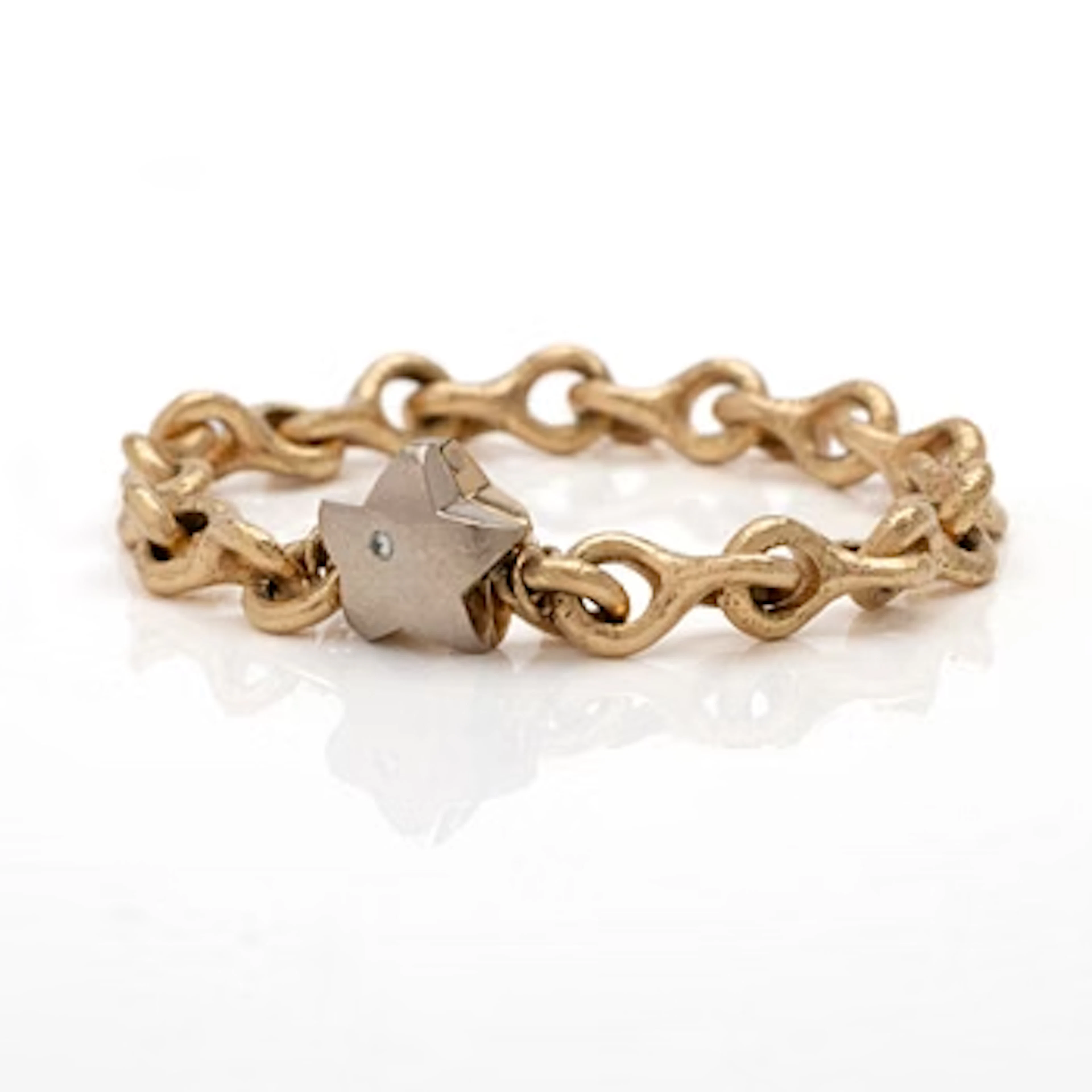 18K gold bracelet with a diamond.