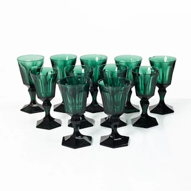 Eleven white wine glasses, green, 19th century.