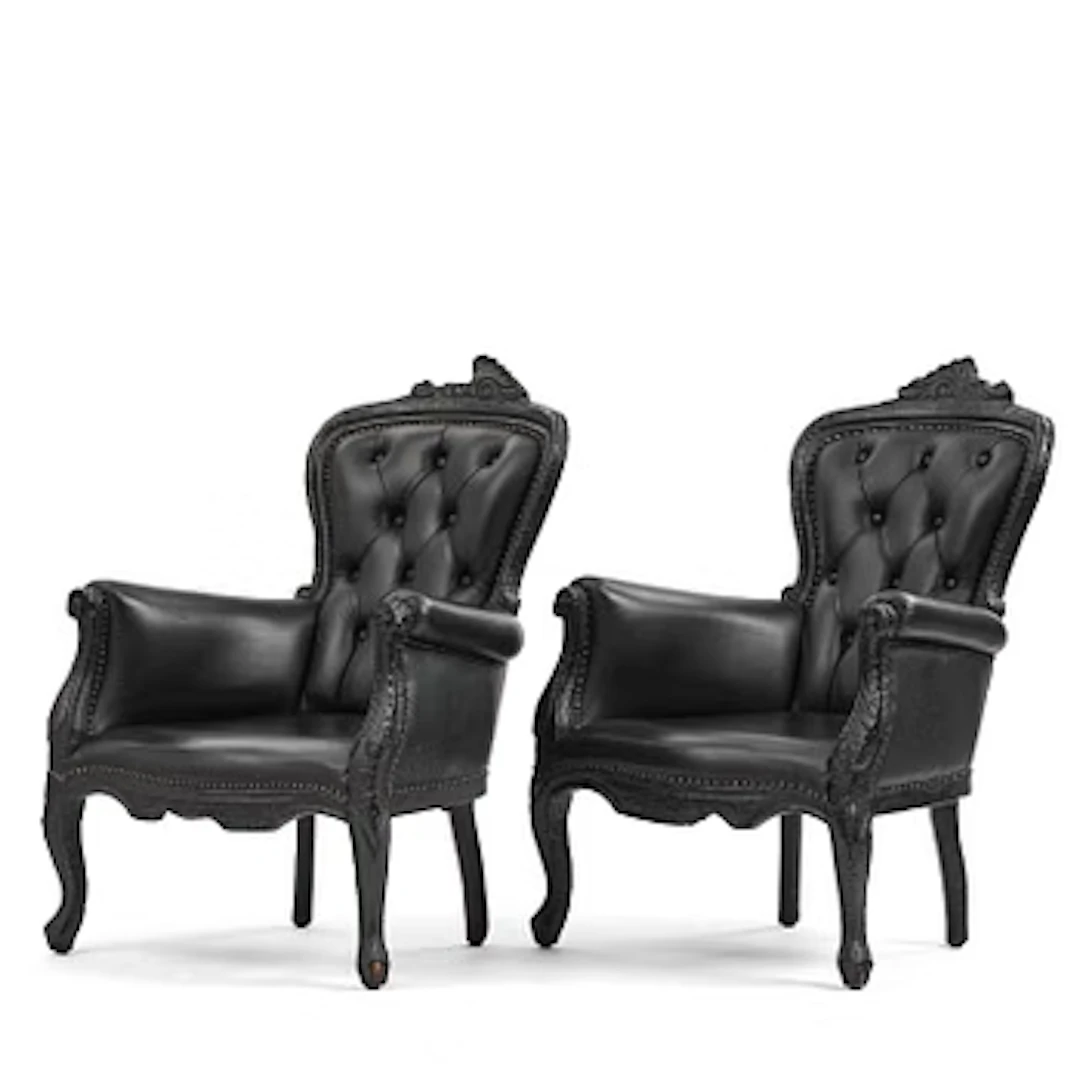 Maarten Baas, a pair of “Smoke Armchairs”, Moooi, the Netherlands, post 2002.