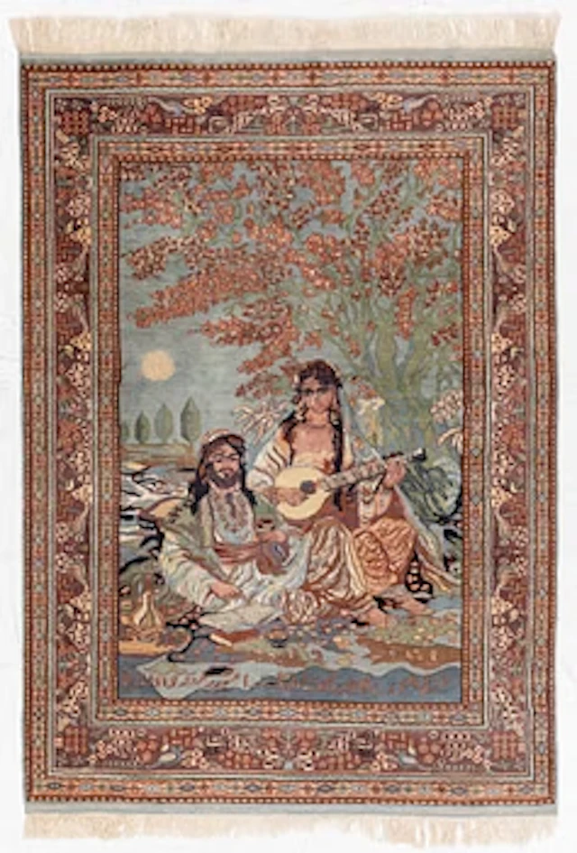 An oriental figural rug, c. 182 x 128 cm.