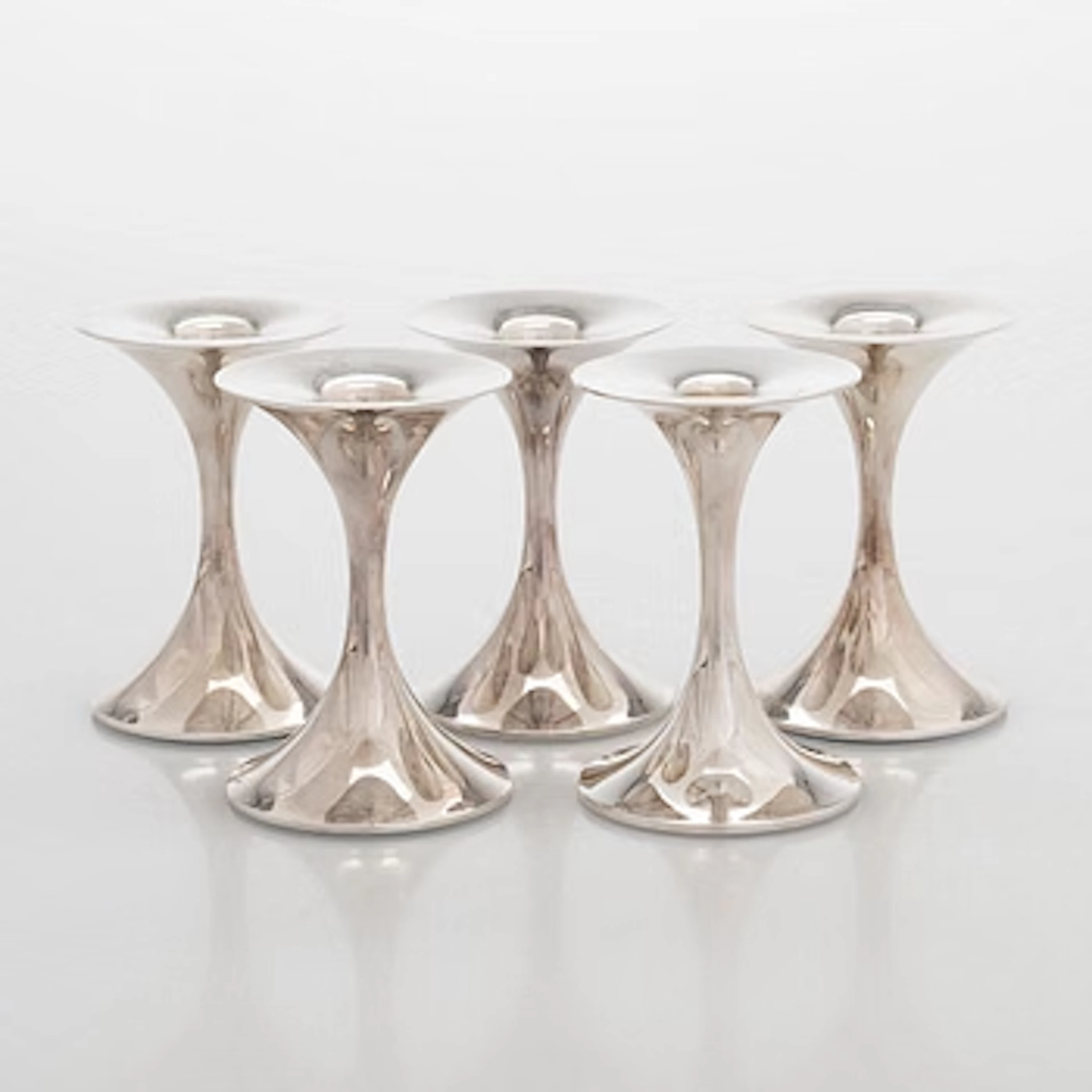 Tapio Wirkkala, A set of five silver 'Trumpet' candlesticks, Kultakeskus